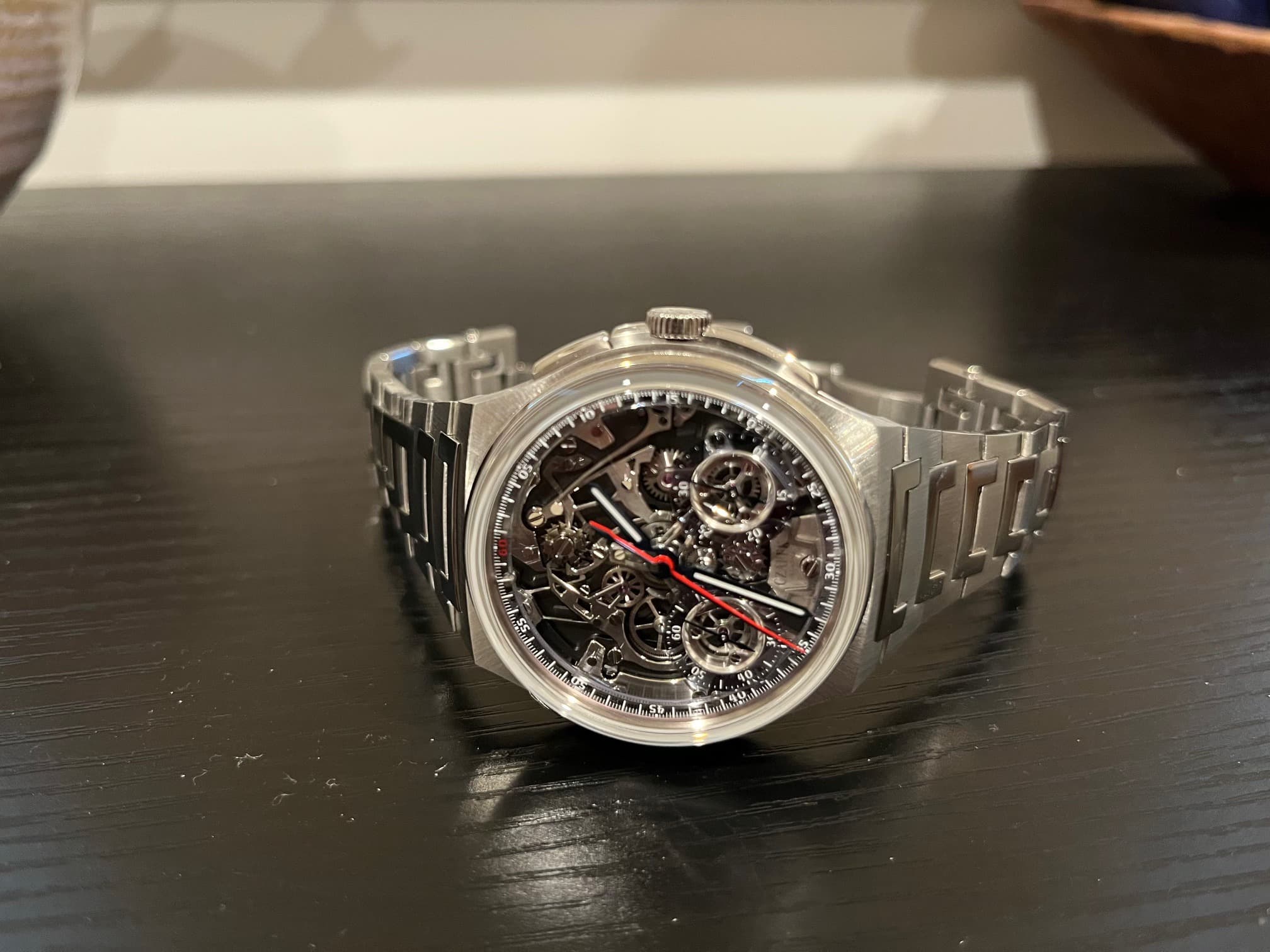 May be an image of wrist watch and text