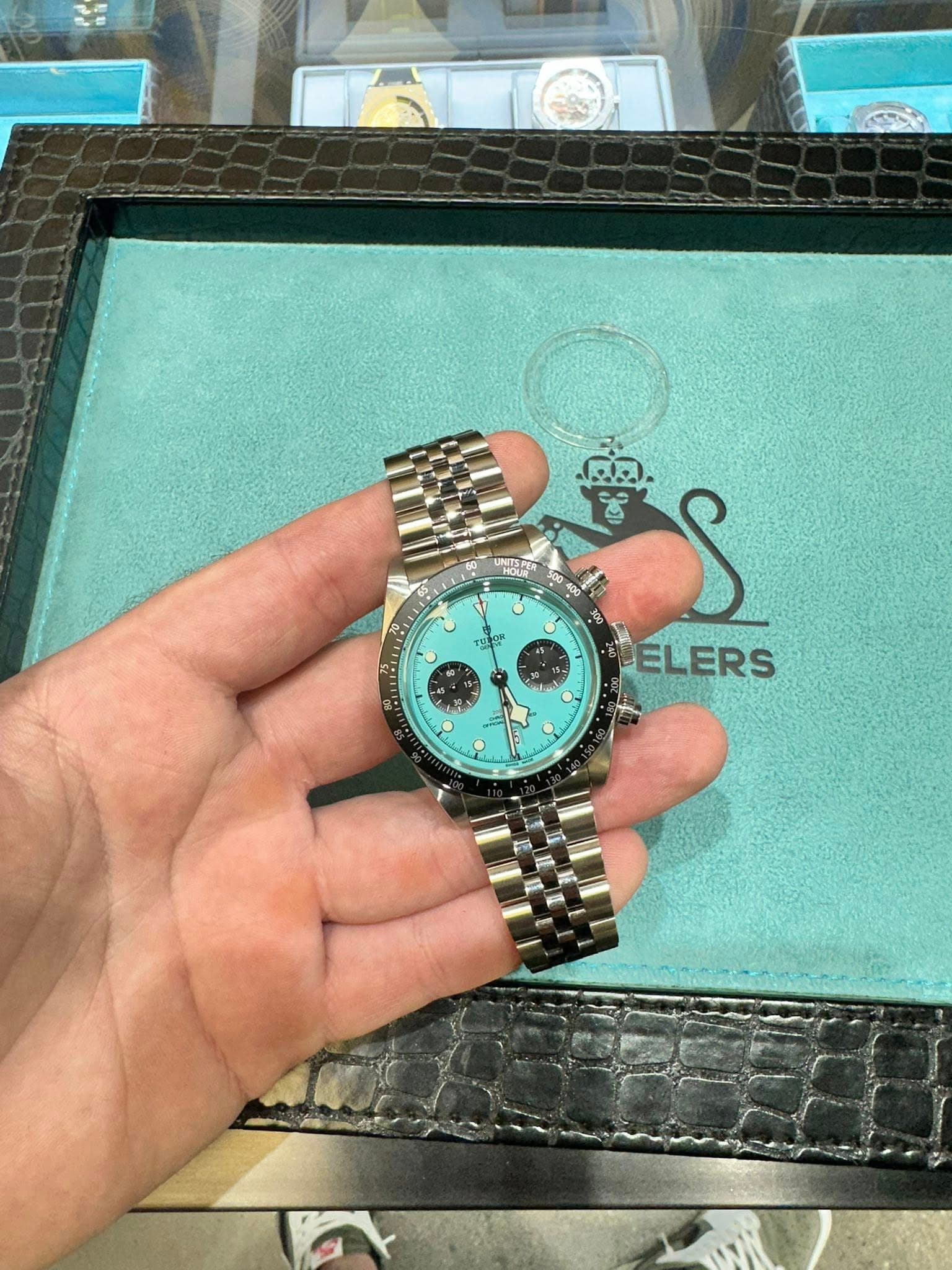May be an image of wrist watch and text