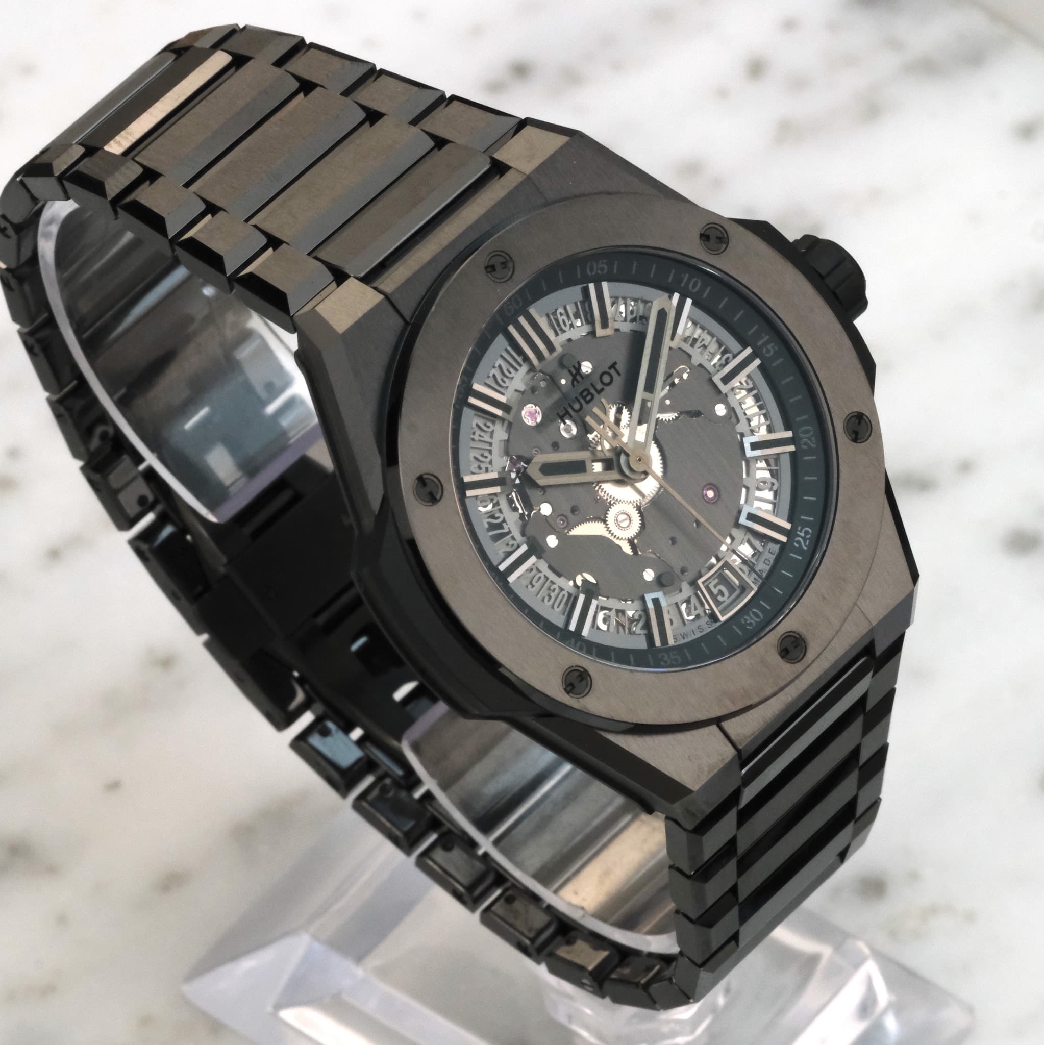 May be an image of wrist watch and text