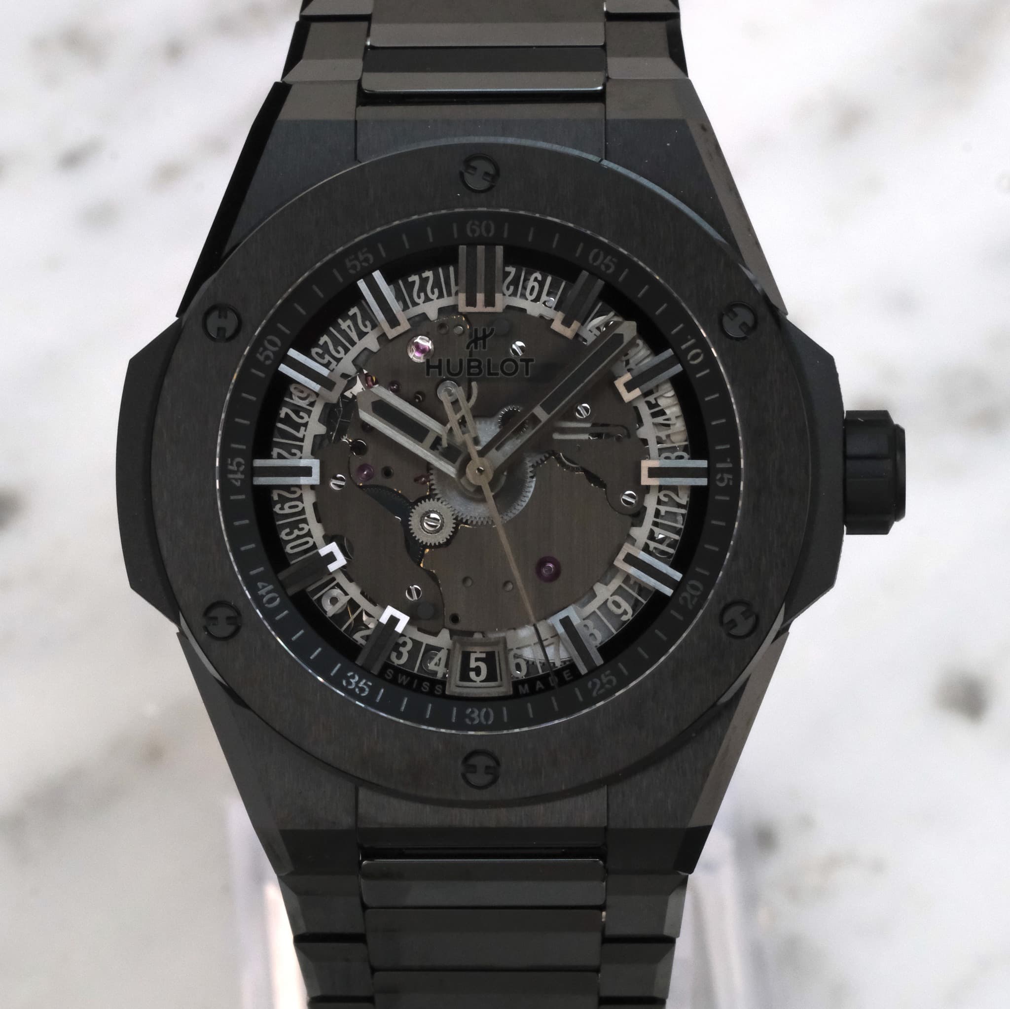 May be an image of wrist watch and text