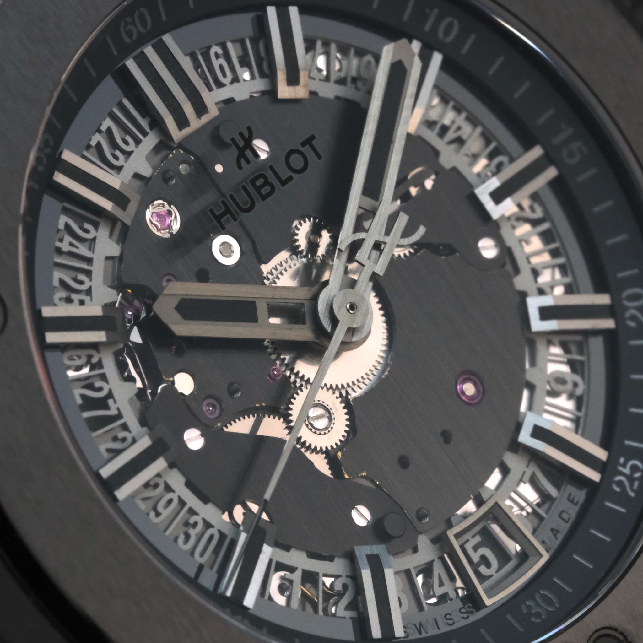 May be an image of wrist watch and text