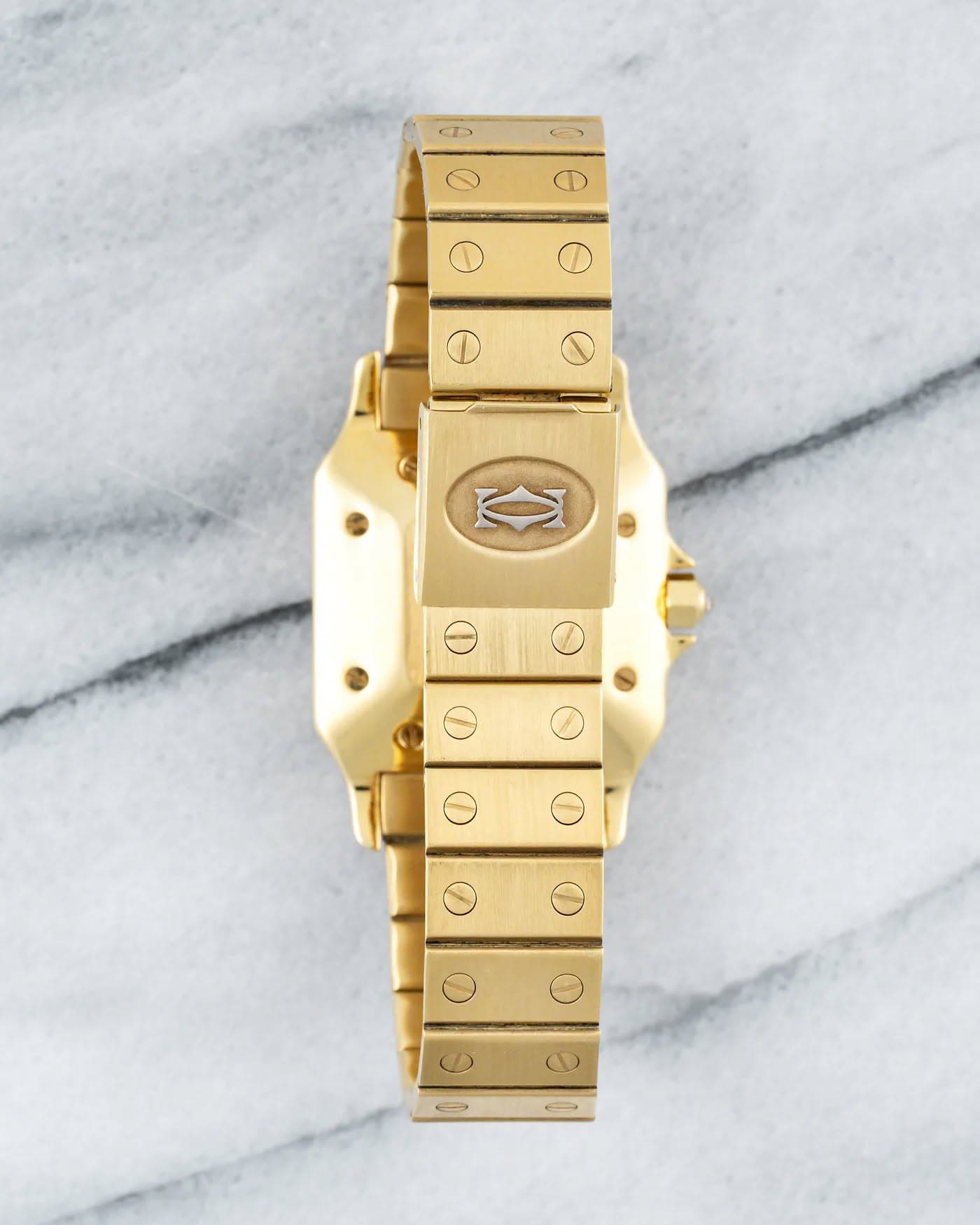 May be an image of wrist watch and text that says 'CD'