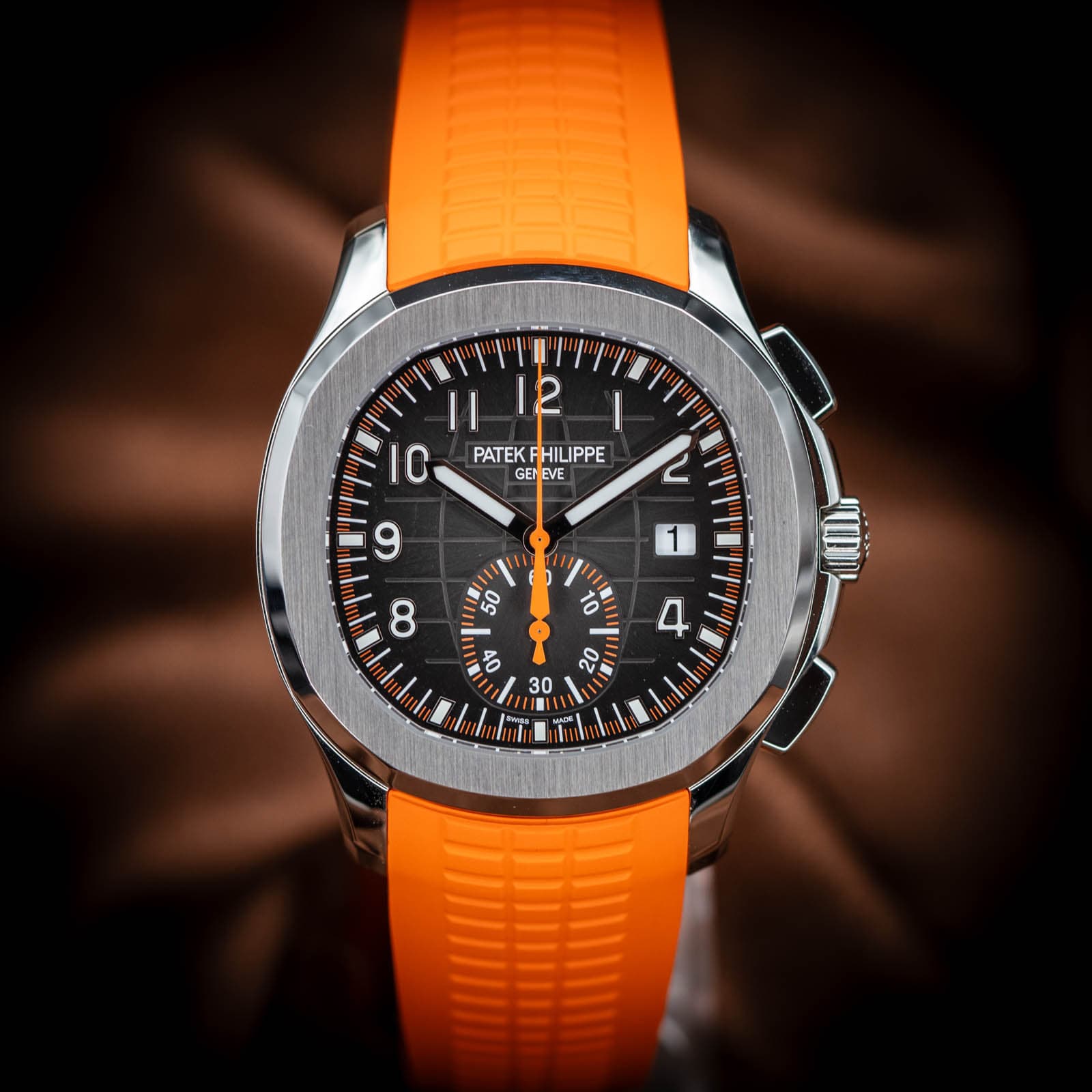 May be an image of wrist watch and text that says '12 PATEK EKPHILIPPE GEN NEV EVE 0 し و ሞ''"' ထ 1 の 50 ل 4 20 ل1 30 TARSSA'