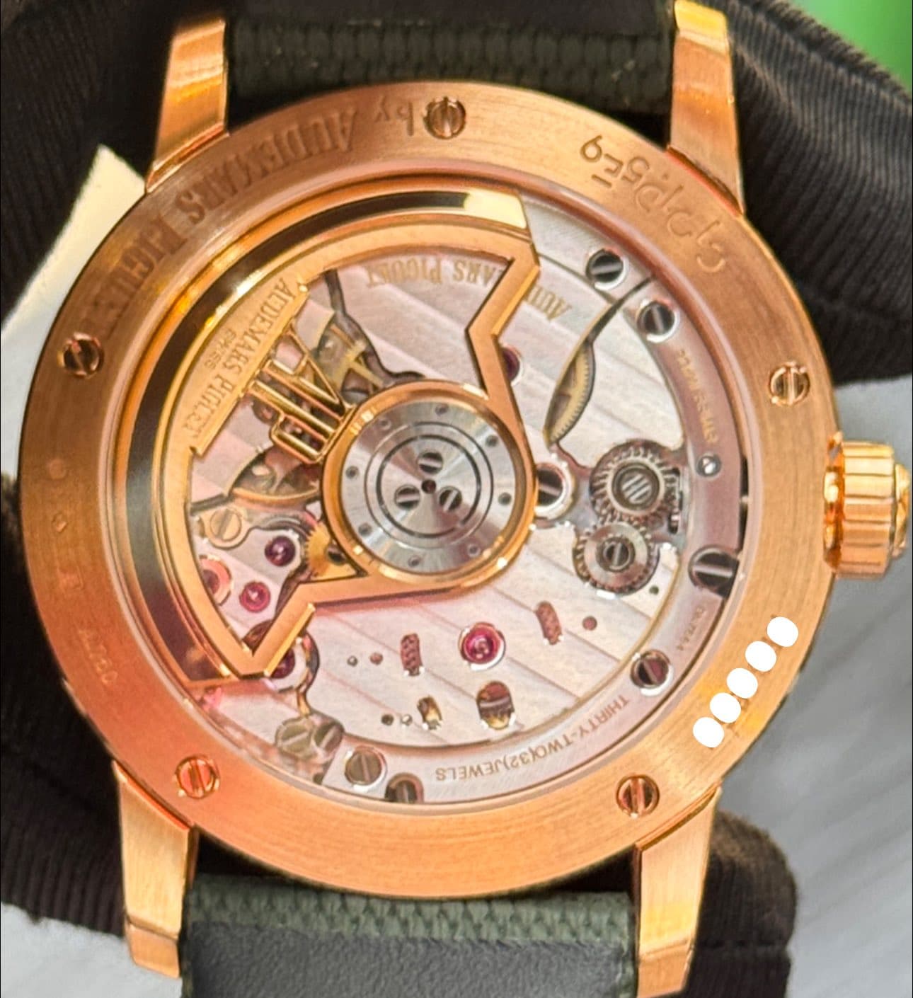 May be an image of wrist watch and text