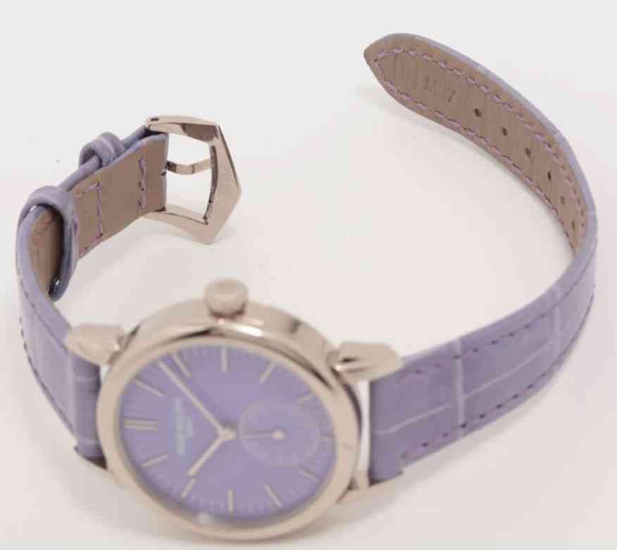 May be an image of digital watch and leather