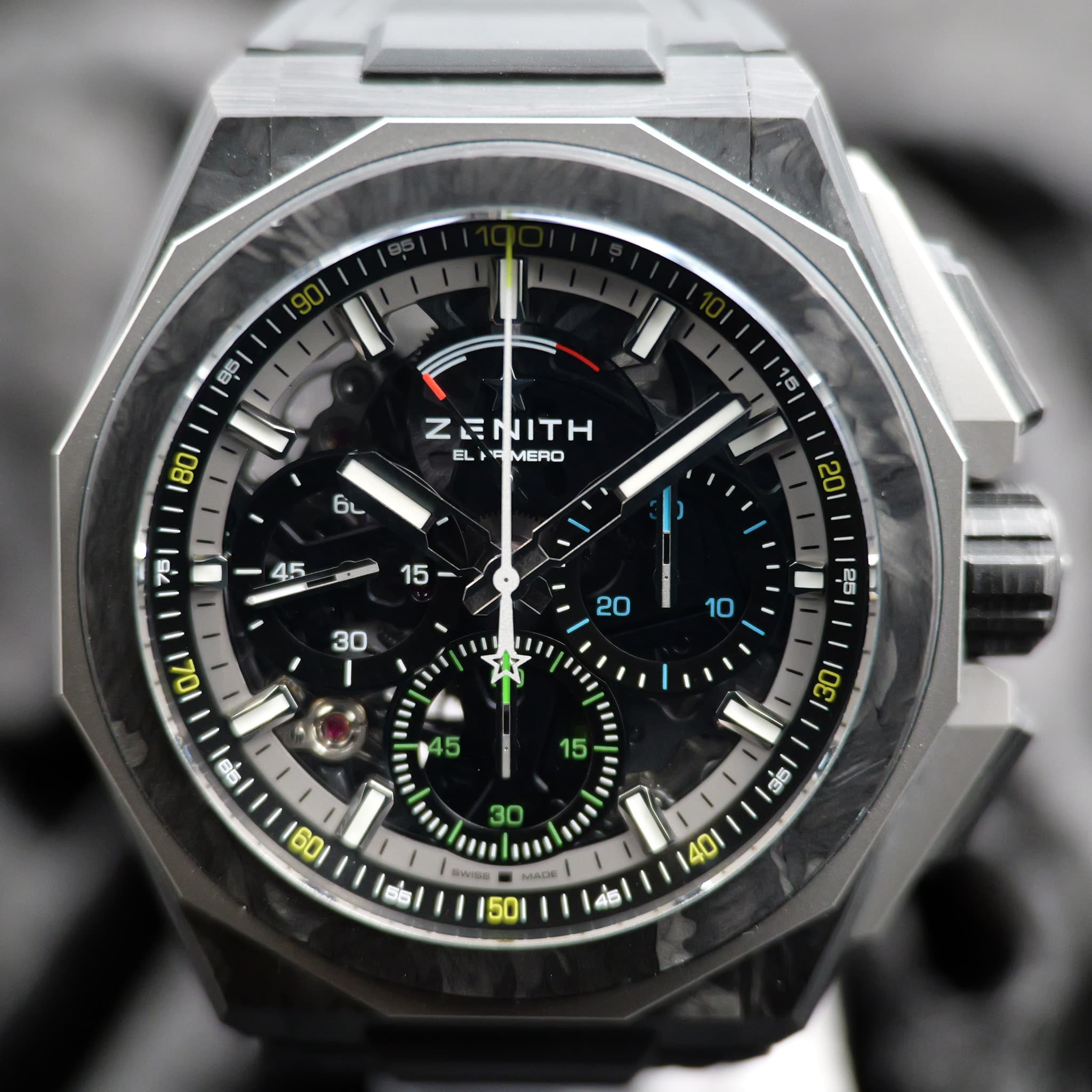 May be an image of digital watch and text that says 'នុន I 801 z ZENITH EL MERO 6L 15 I I 1 1041 11I 10 25 ខត I 30 60 35 I គាាបាជិ ΜAWE '