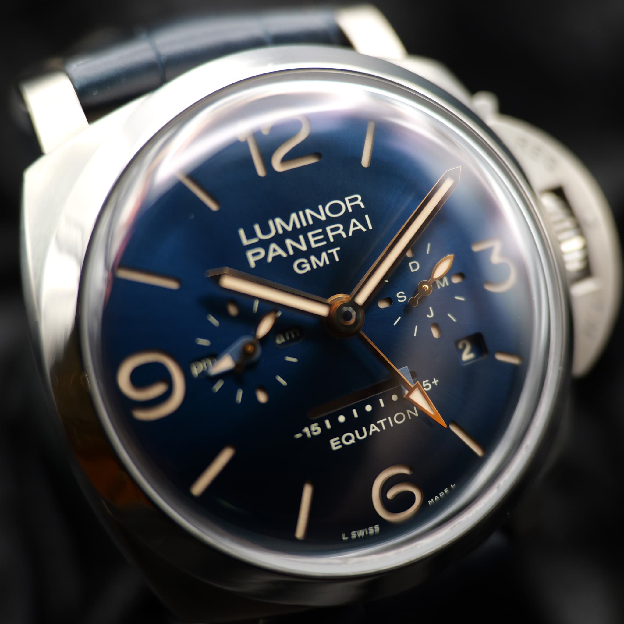 May be an image of wrist watch and text