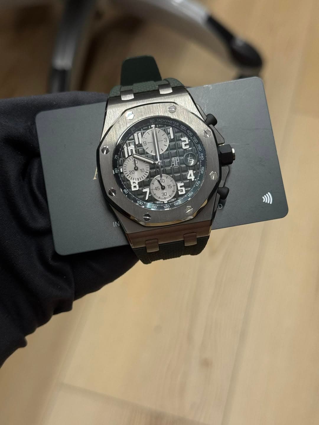 May be an image of wrist watch and text