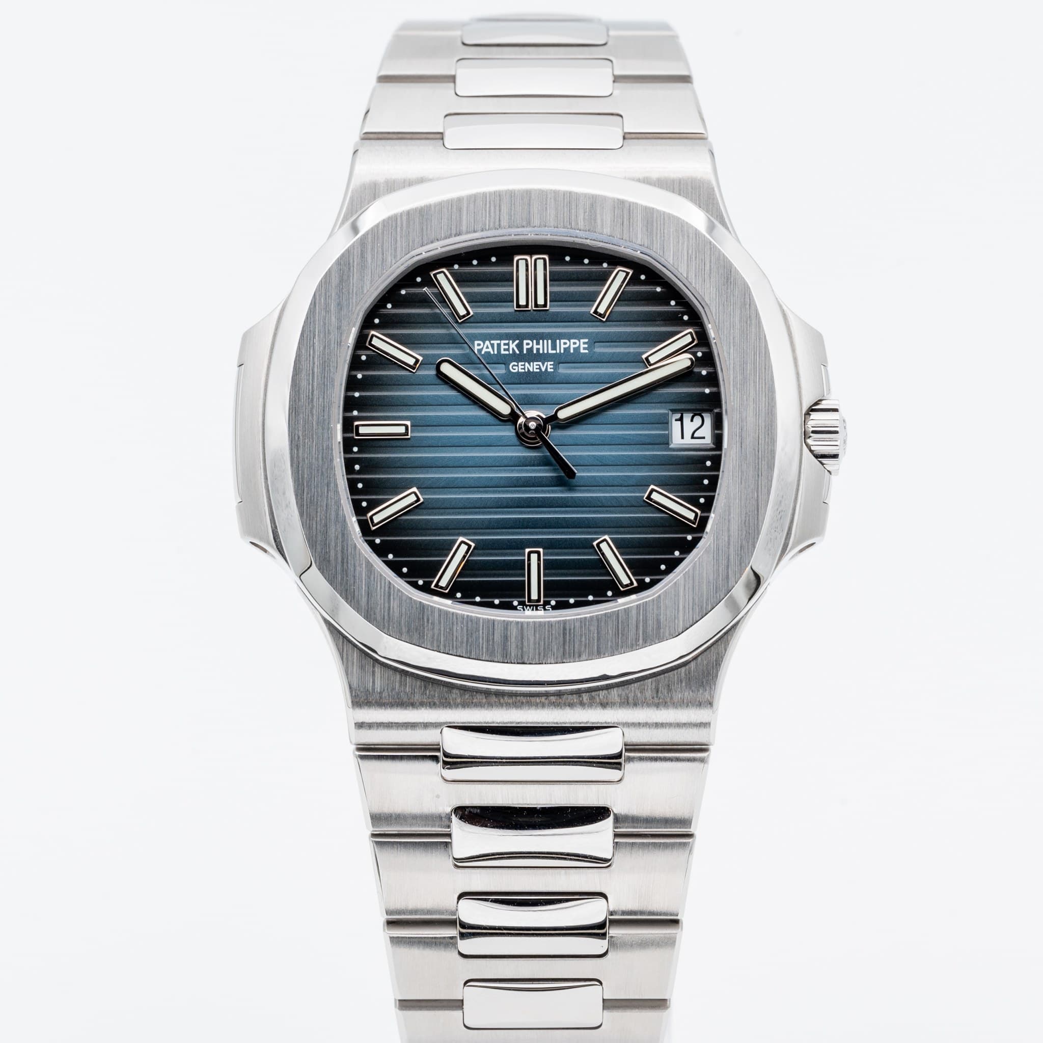 May be an image of wrist watch and text that says 'PATEK PATEKPHILIPPE PHILIPPE GENEVE 12 0'
