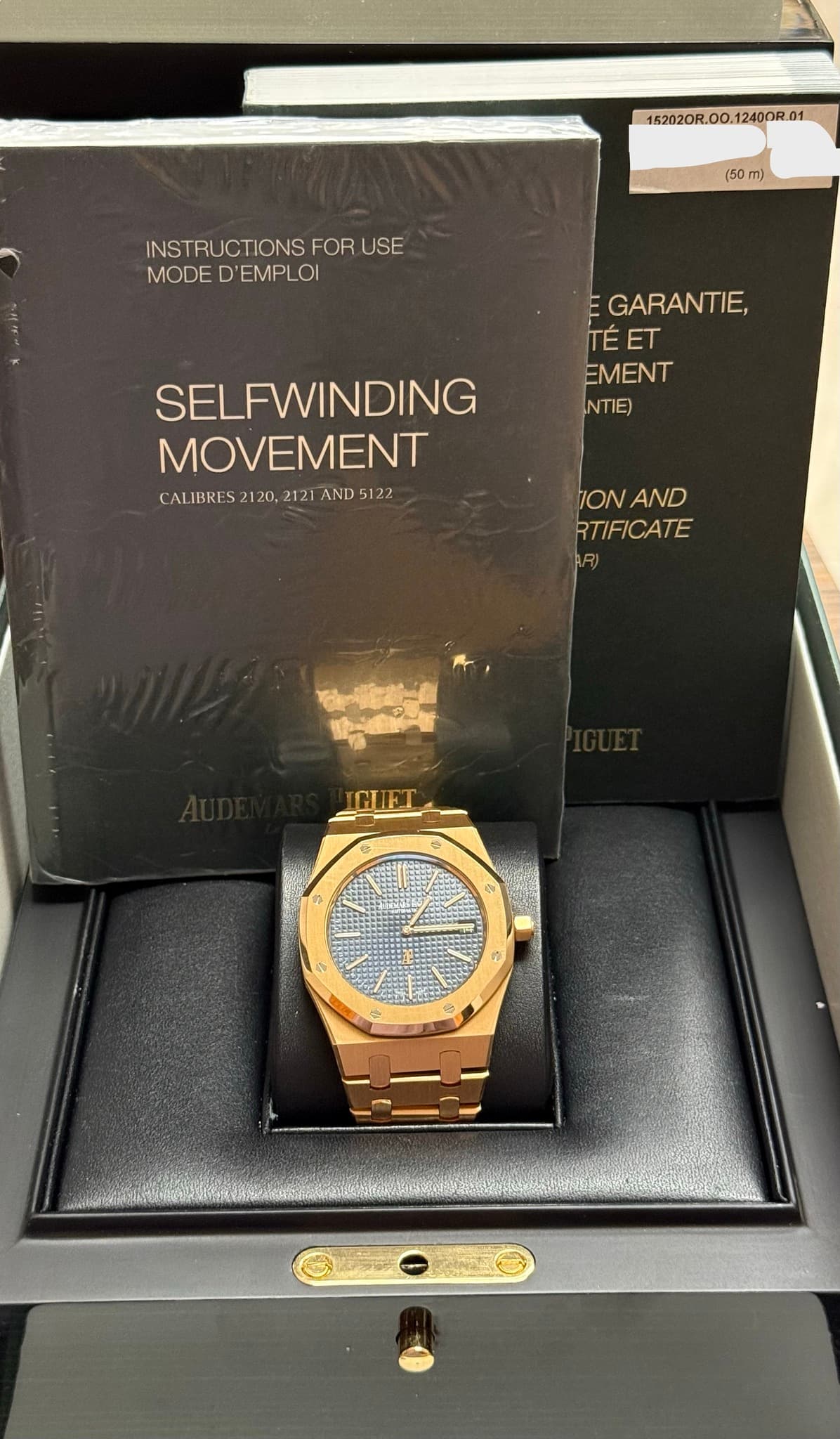 May be an image of wrist watch and text that says '152020R.00.12400R.01 12400R (50 m) INSTRUCTIONSFORUS USE FOR MODED'EMPLOI MODE D'EMPLOI GARANTIE, TÉET ET EMENT NTIE) SELFWINDING…