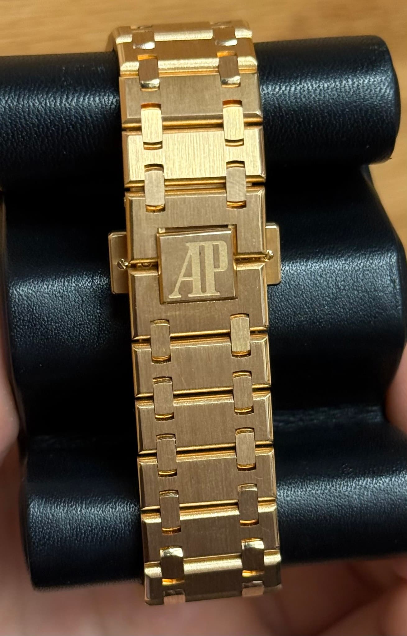 May be an image of wrist watch, jewelry and text