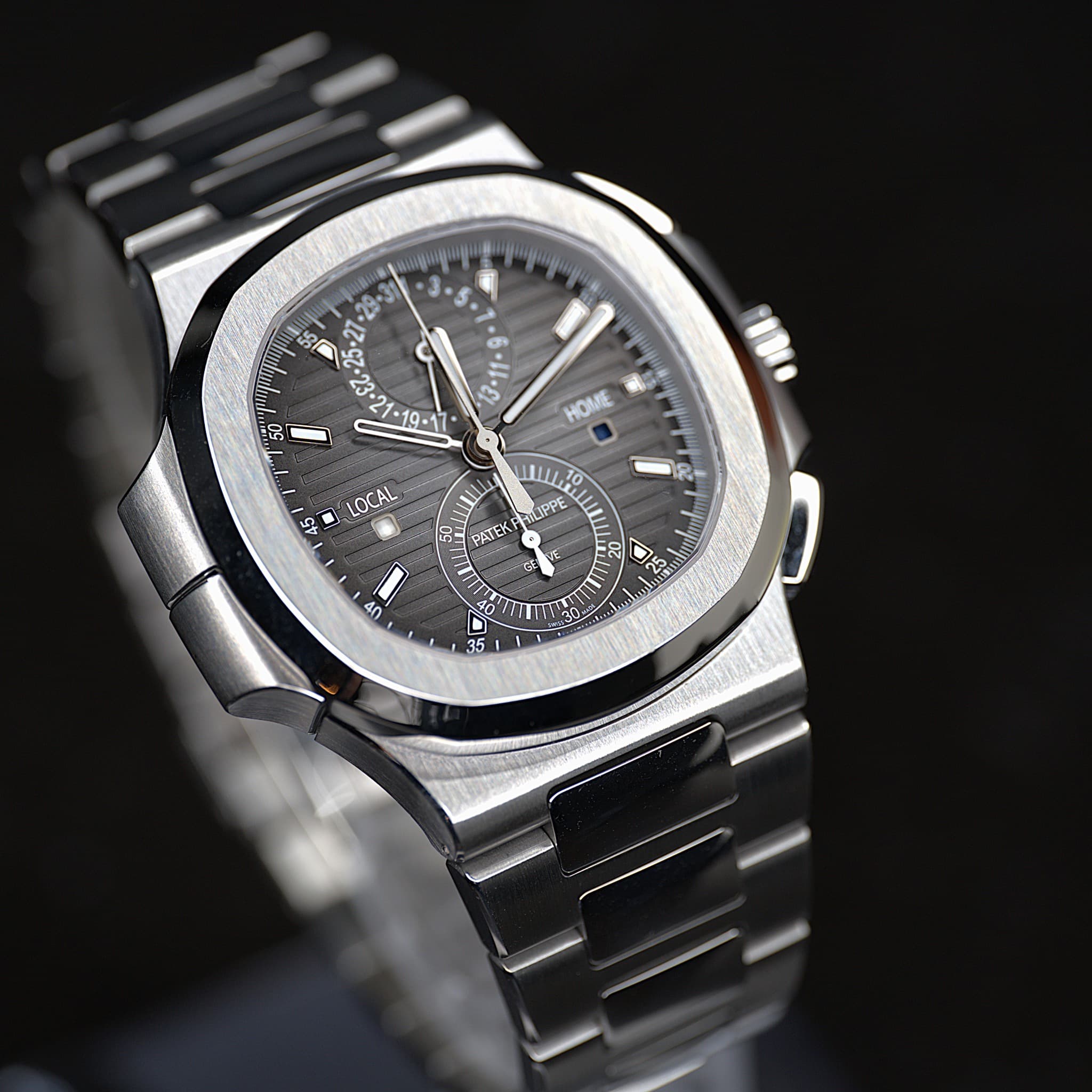 May be an image of wrist watch and text