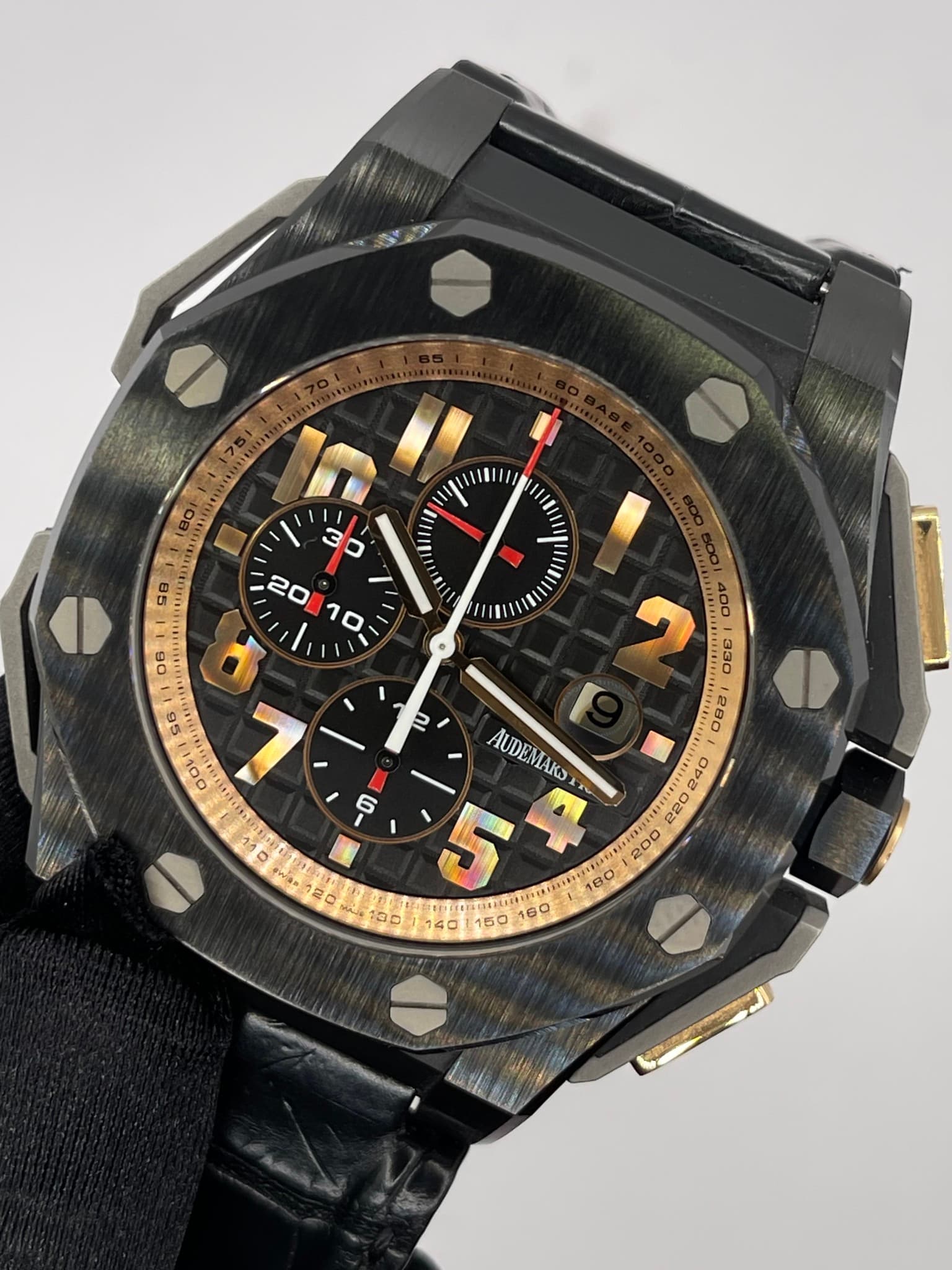 May be an image of wrist watch and text