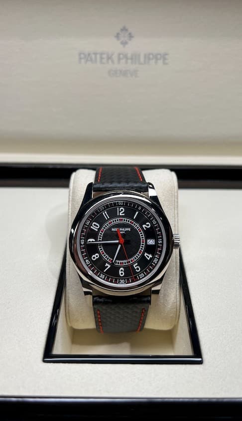 May be an image of wrist watch and text that says 'PATEK TEKPHILIPPE GENIVE Il 12 50 10 TUE Pu PATT 6K HUPP P OV OV 8 東車車方 7 35 ab '