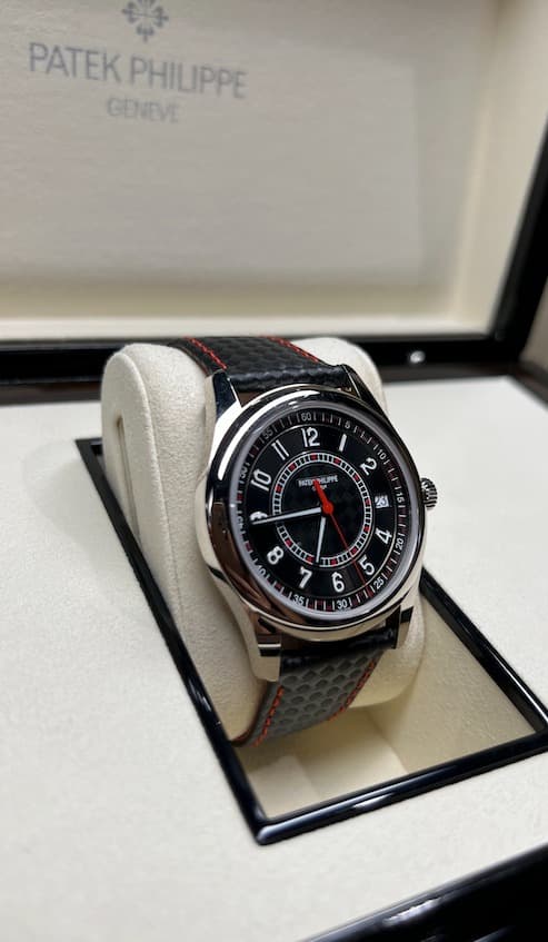 May be an image of wrist watch and text