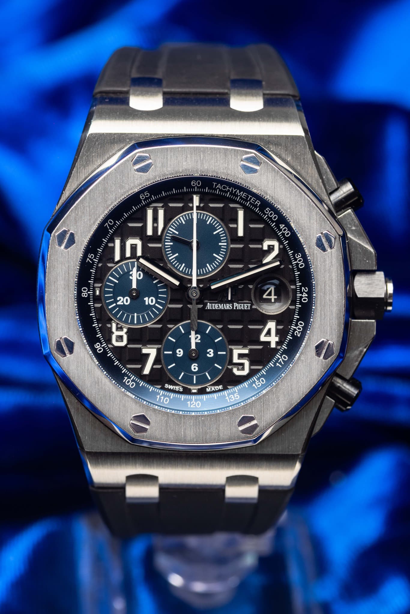 May be an image of wrist watch and text