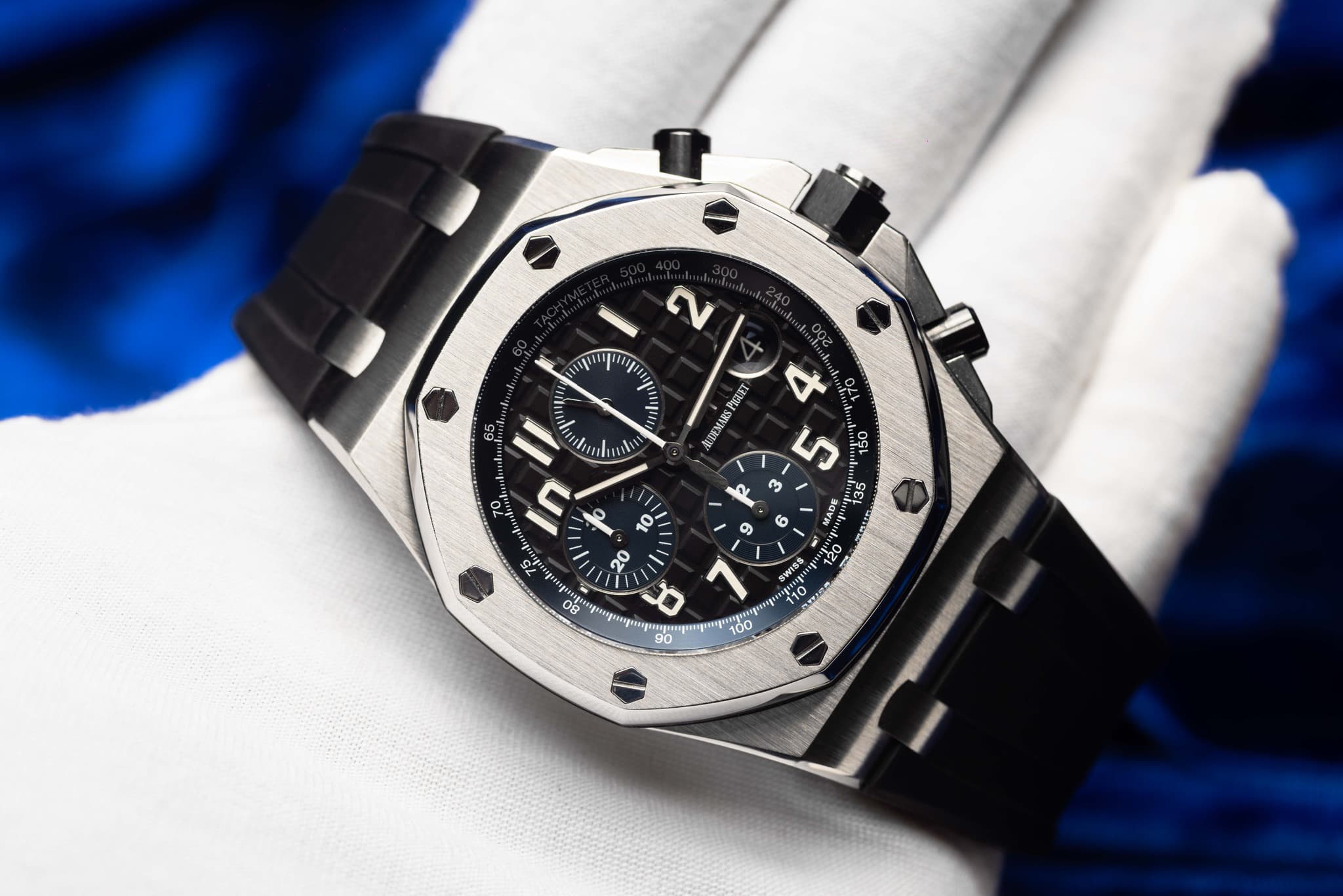 May be an image of wrist watch and text