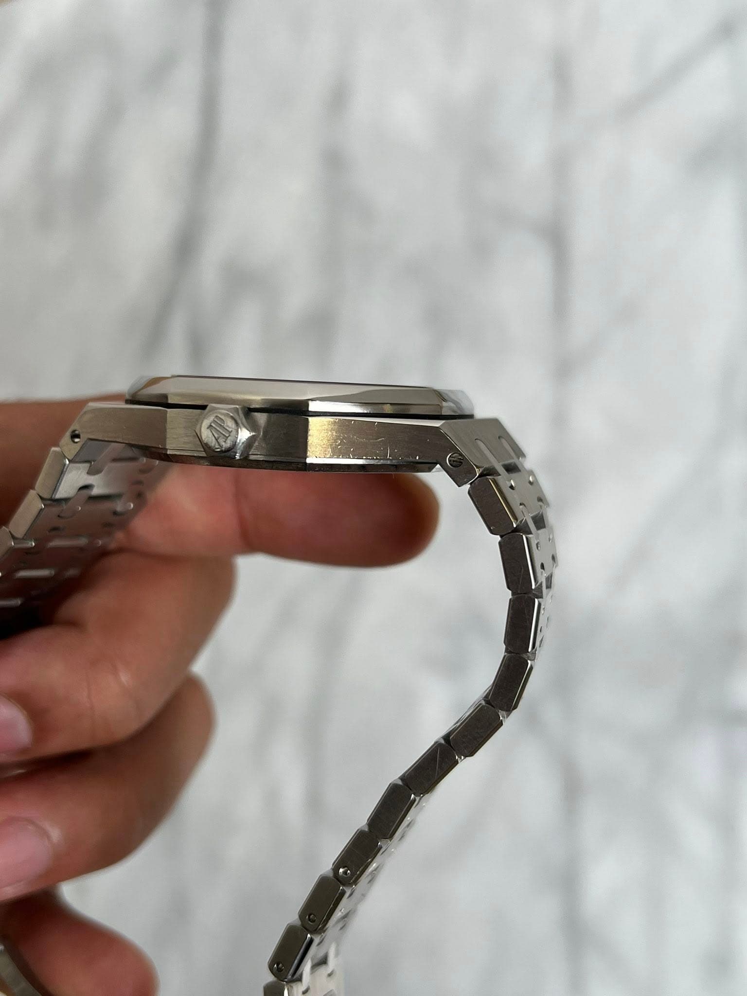 May be an image of wrist watch