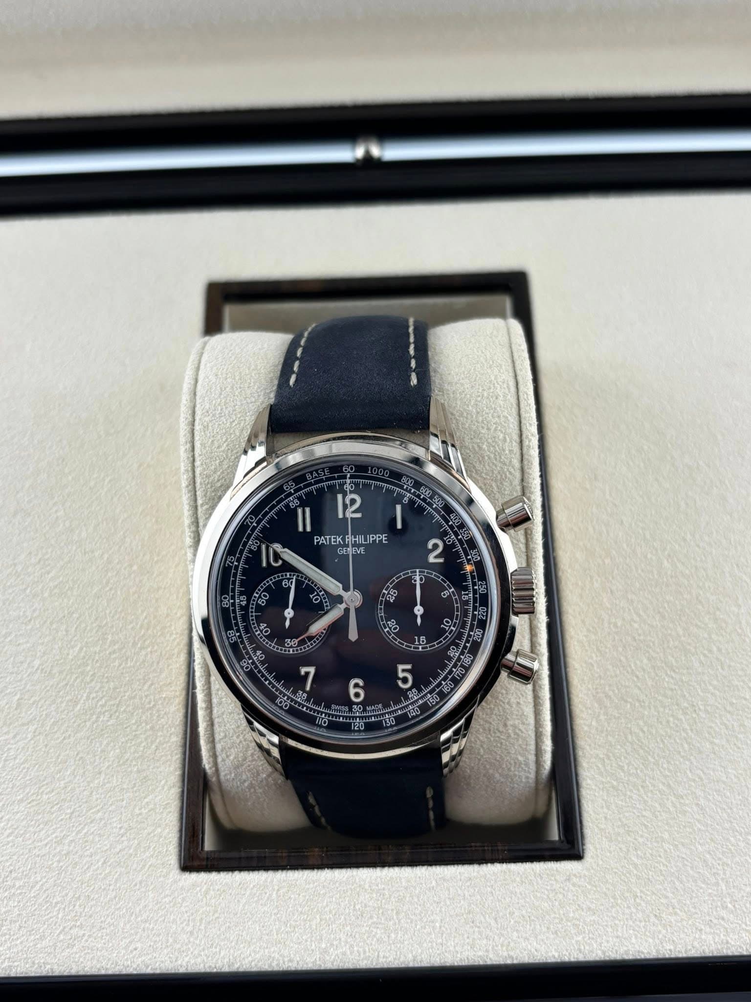 May be an image of wrist watch and text