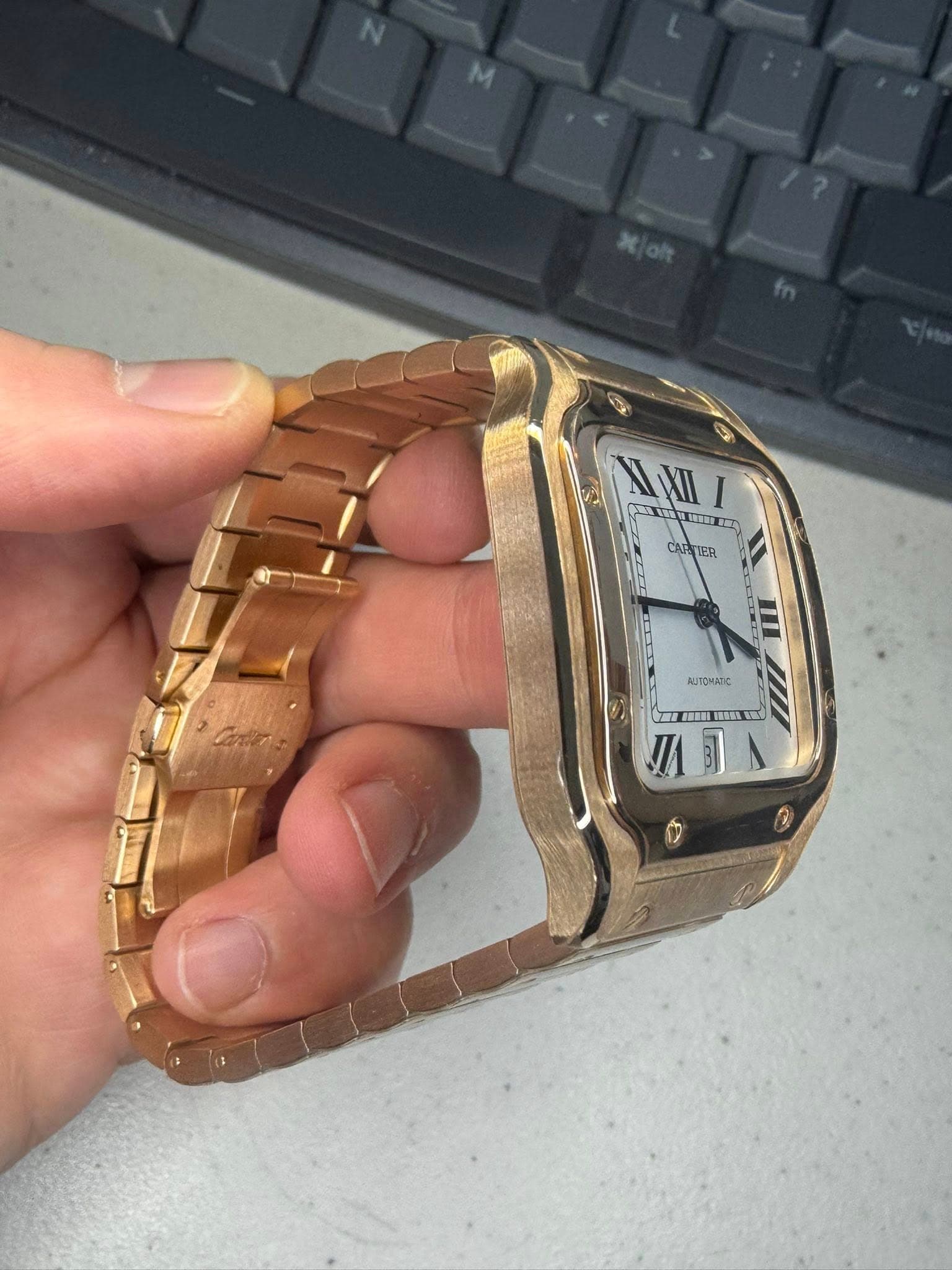 May be an image of digital watch and text