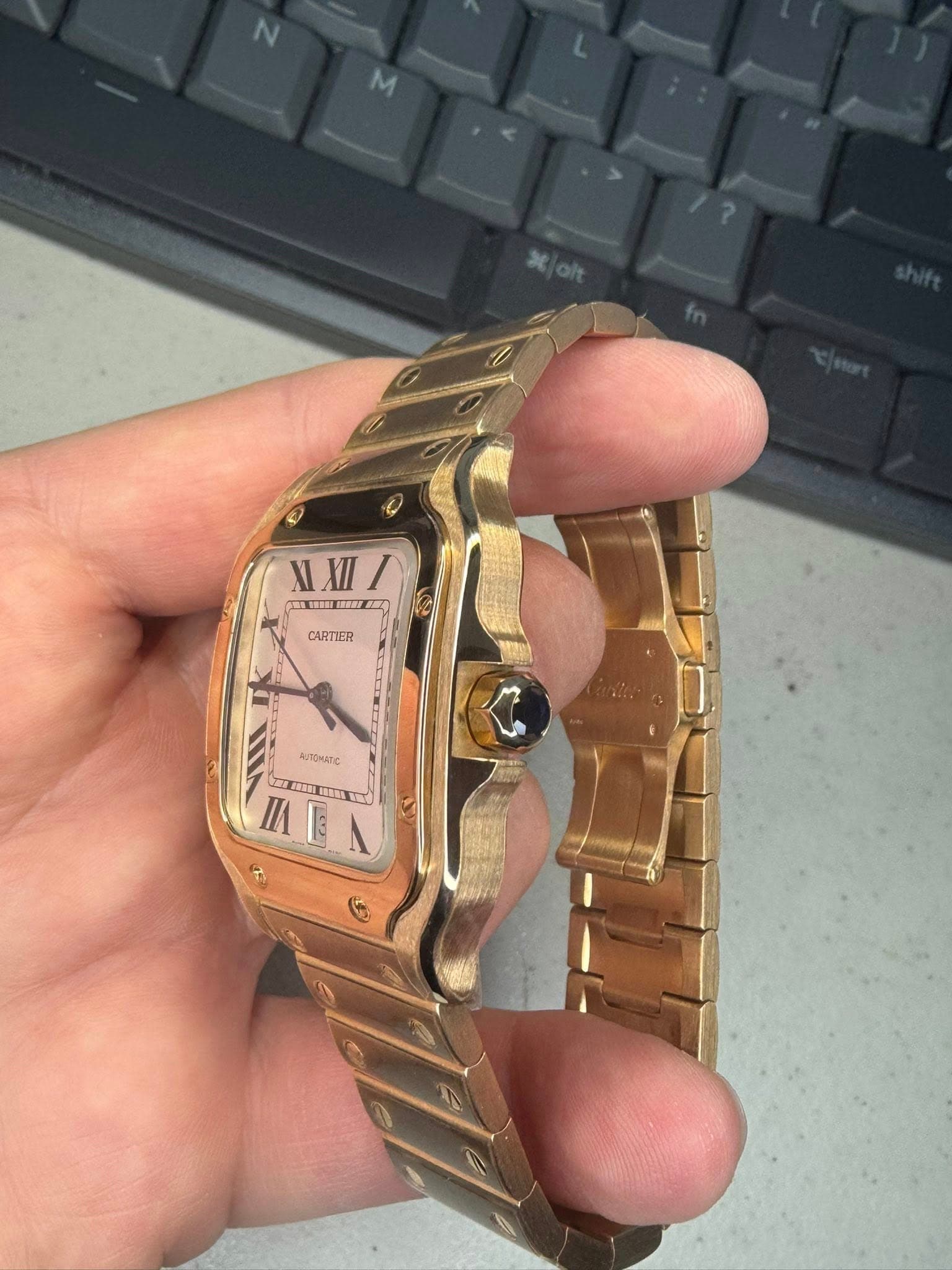 May be an image of digital watch and text