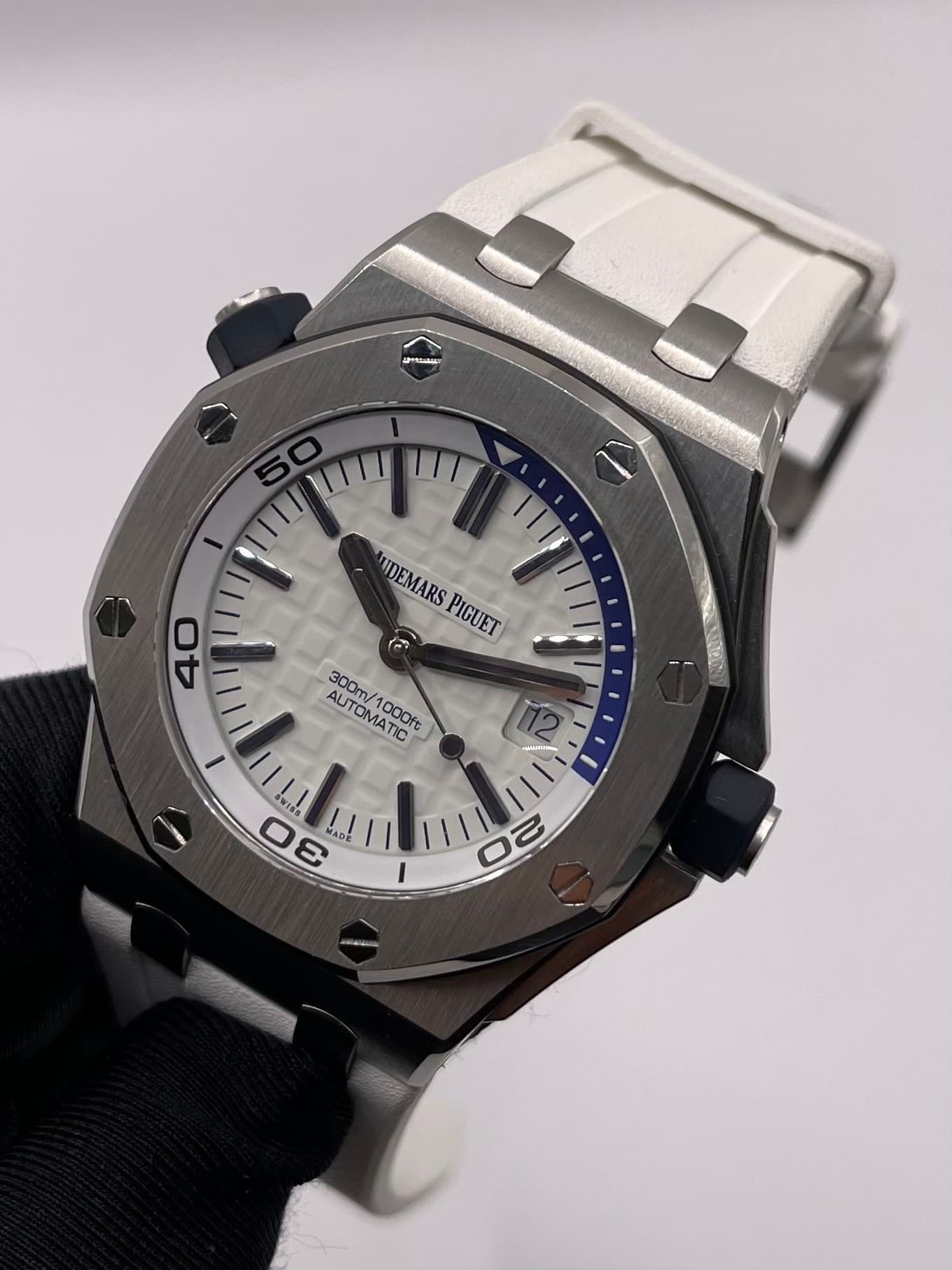 May be an image of wrist watch and text