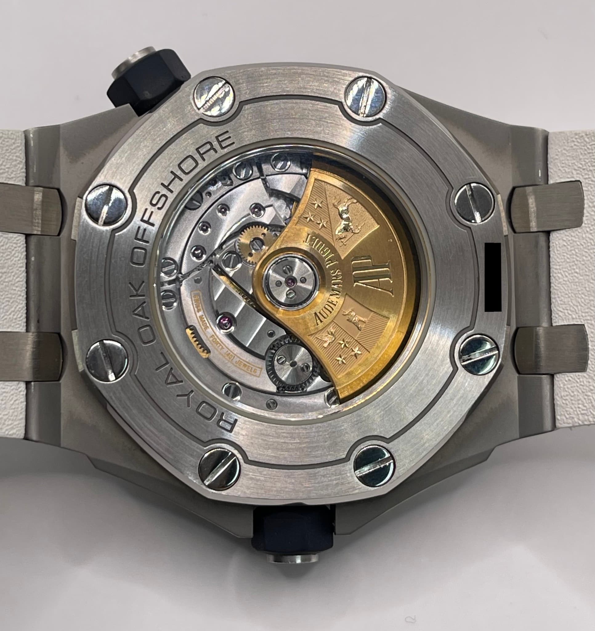 May be an image of wrist watch and text