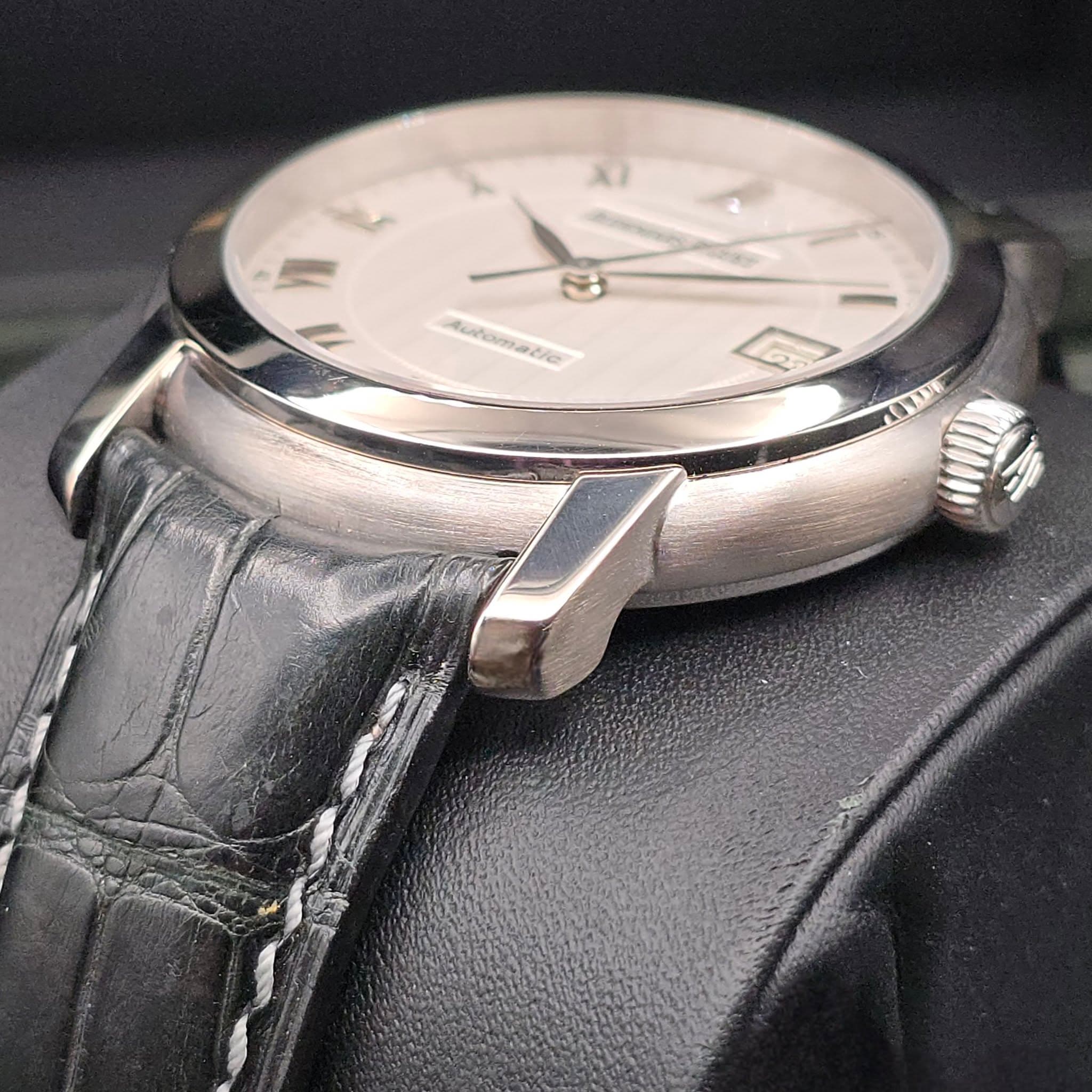 May be an image of wrist watch
