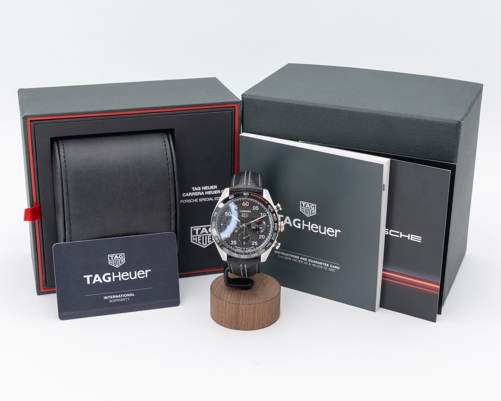 May be an image of wrist watch and text that says 'TAG HEUER CARRERA HEUER CADECAL HEUER ARRERAHEUE O 05 05 60 ANRA TAG HE CEUED TAGI TAGHeuer HETED 35 20 TAGHeuer NSERNATIONAL…