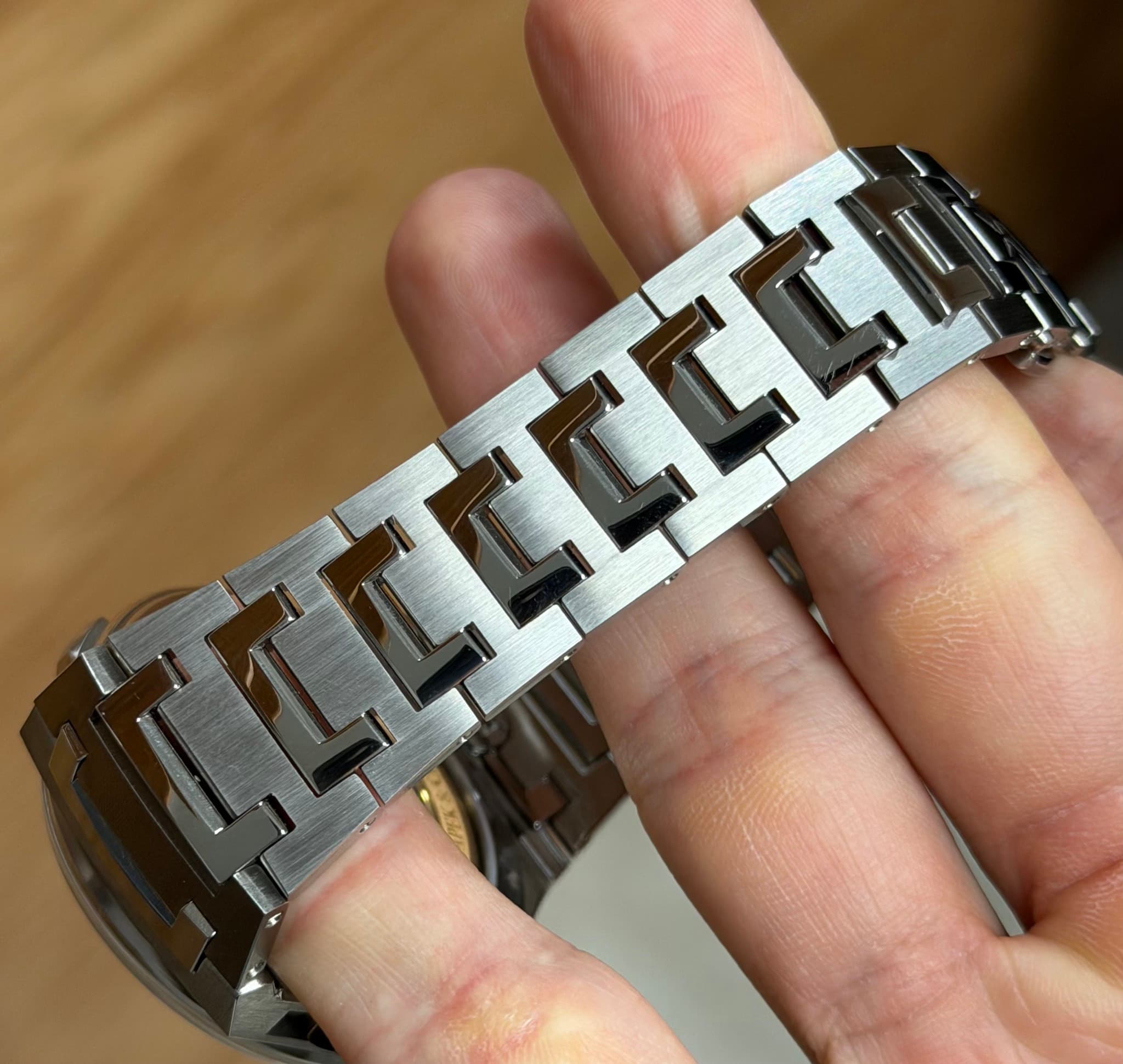 May be an image of wrist watch and text