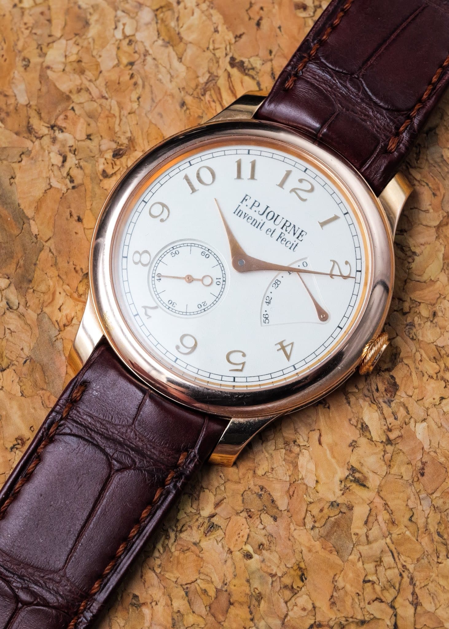 May be an image of wrist watch and text that says 'B Invenit EPJOURNE et et Fecit O OE O 5'