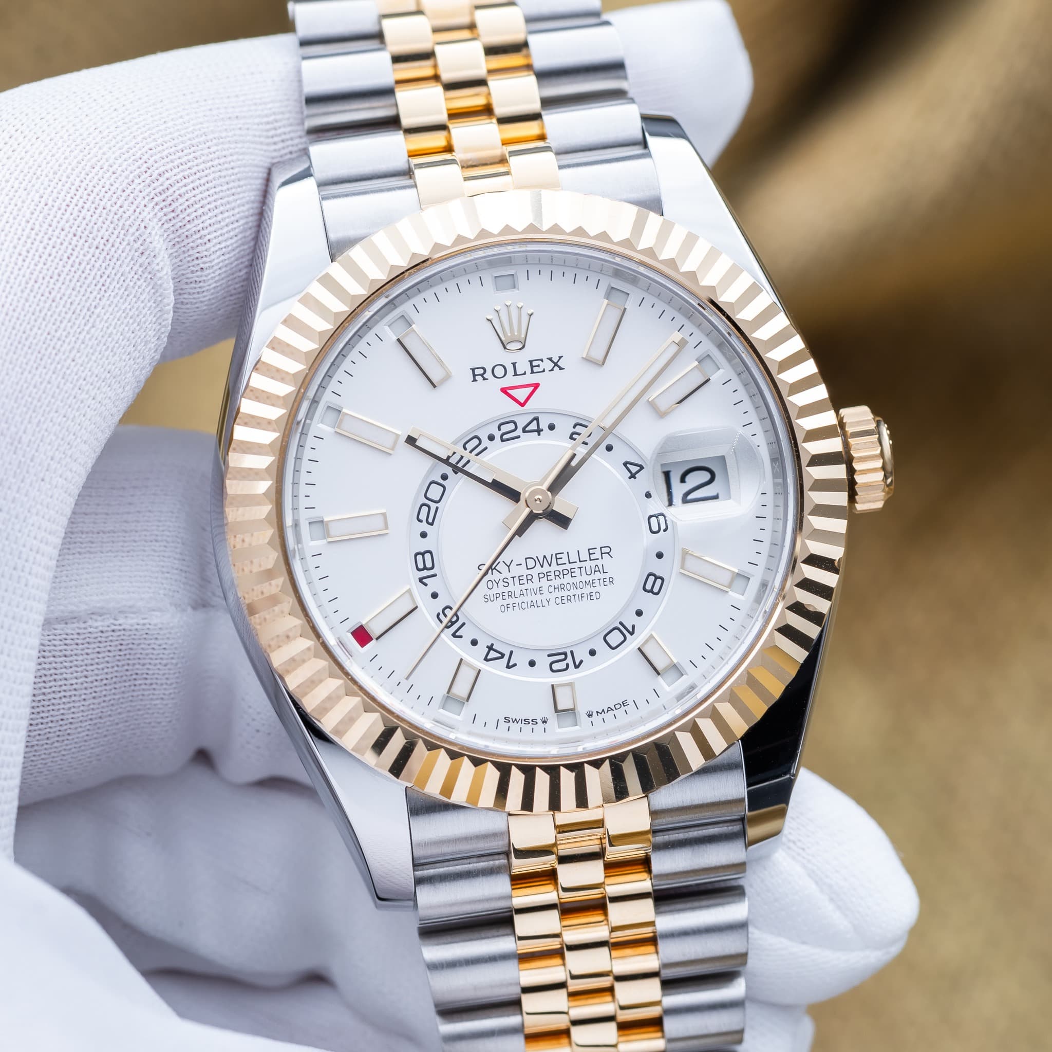 May be an image of wrist watch and text
