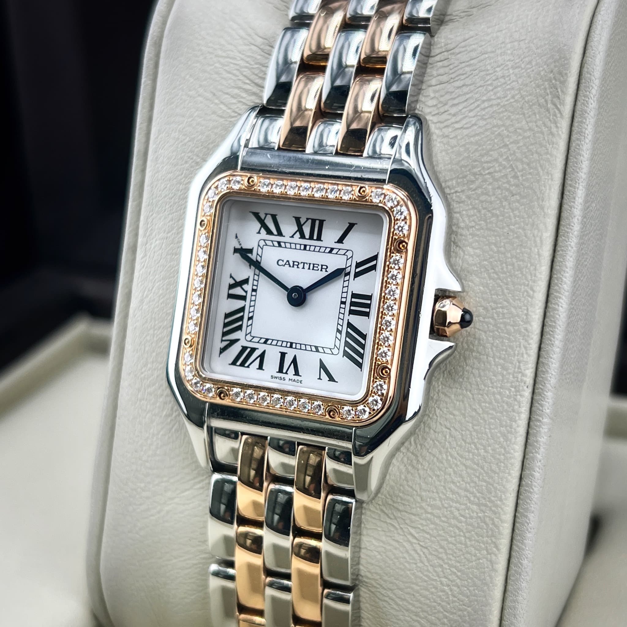 May be an image of wrist watch and text