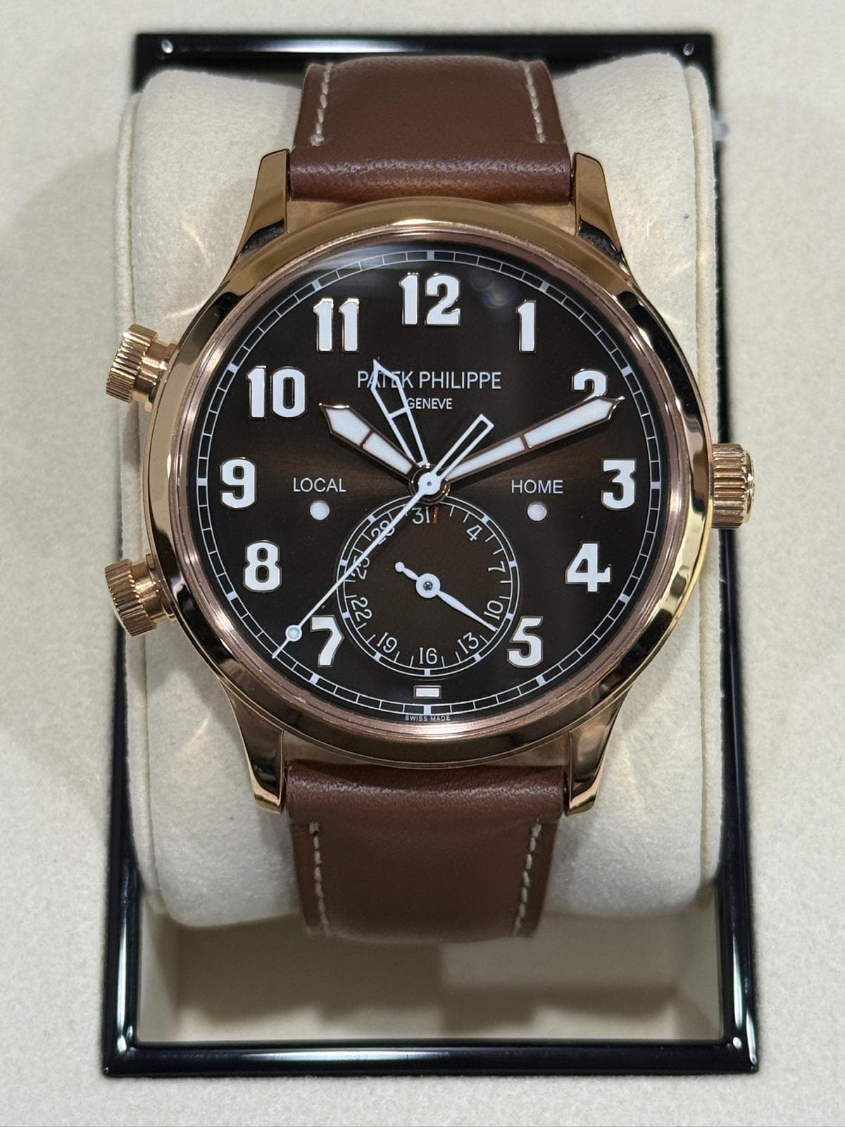 May be an image of wrist watch and text that says ' PHILIPPE GENEVE 2 LOCAL 9 HOME 31 4 3 م , 16 4 3 O 5 - etghter-0O'