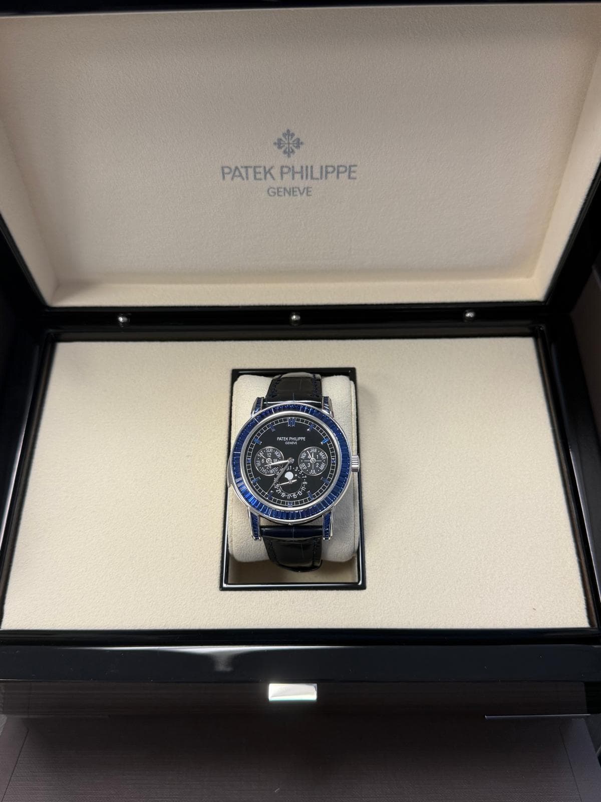 May be an image of wrist watch and text