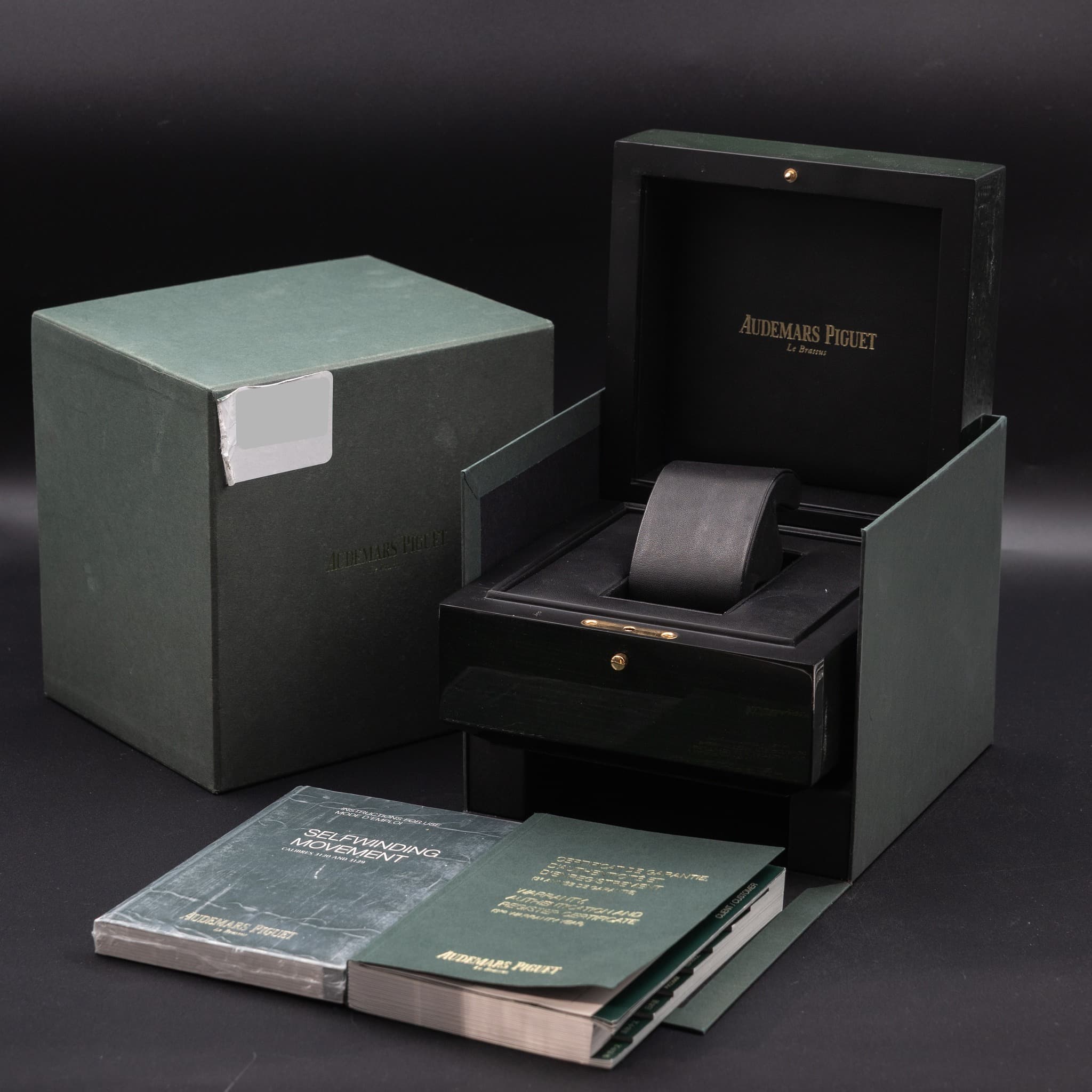 May be an image of wrist watch, book and text