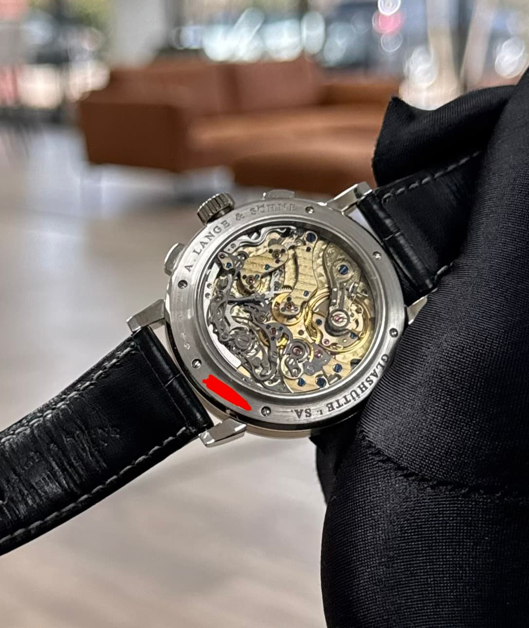 May be an image of wrist watch and text