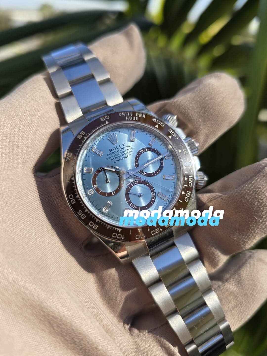 May be an image of wrist watch and text