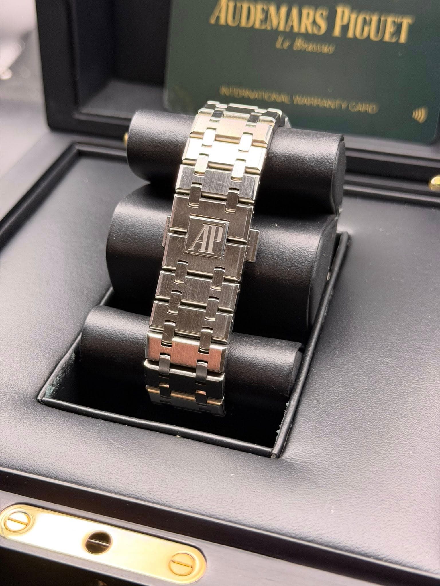May be an image of wrist watch and text