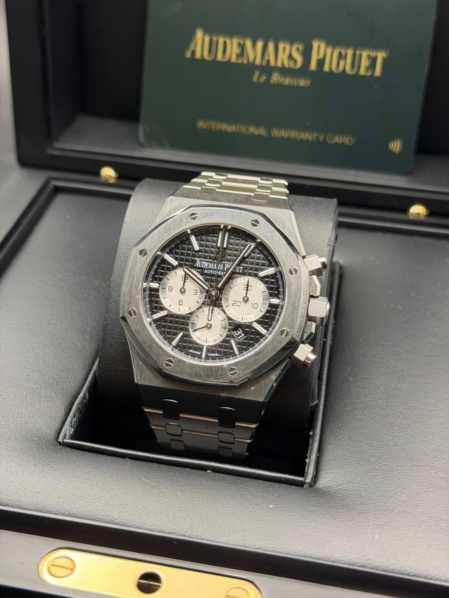 May be an image of wrist watch and text