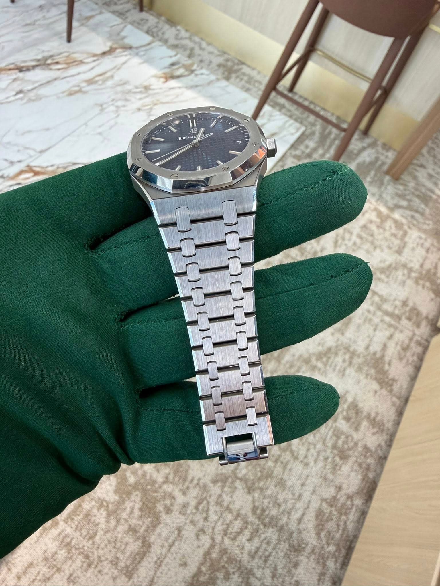 May be an image of wrist watch and text