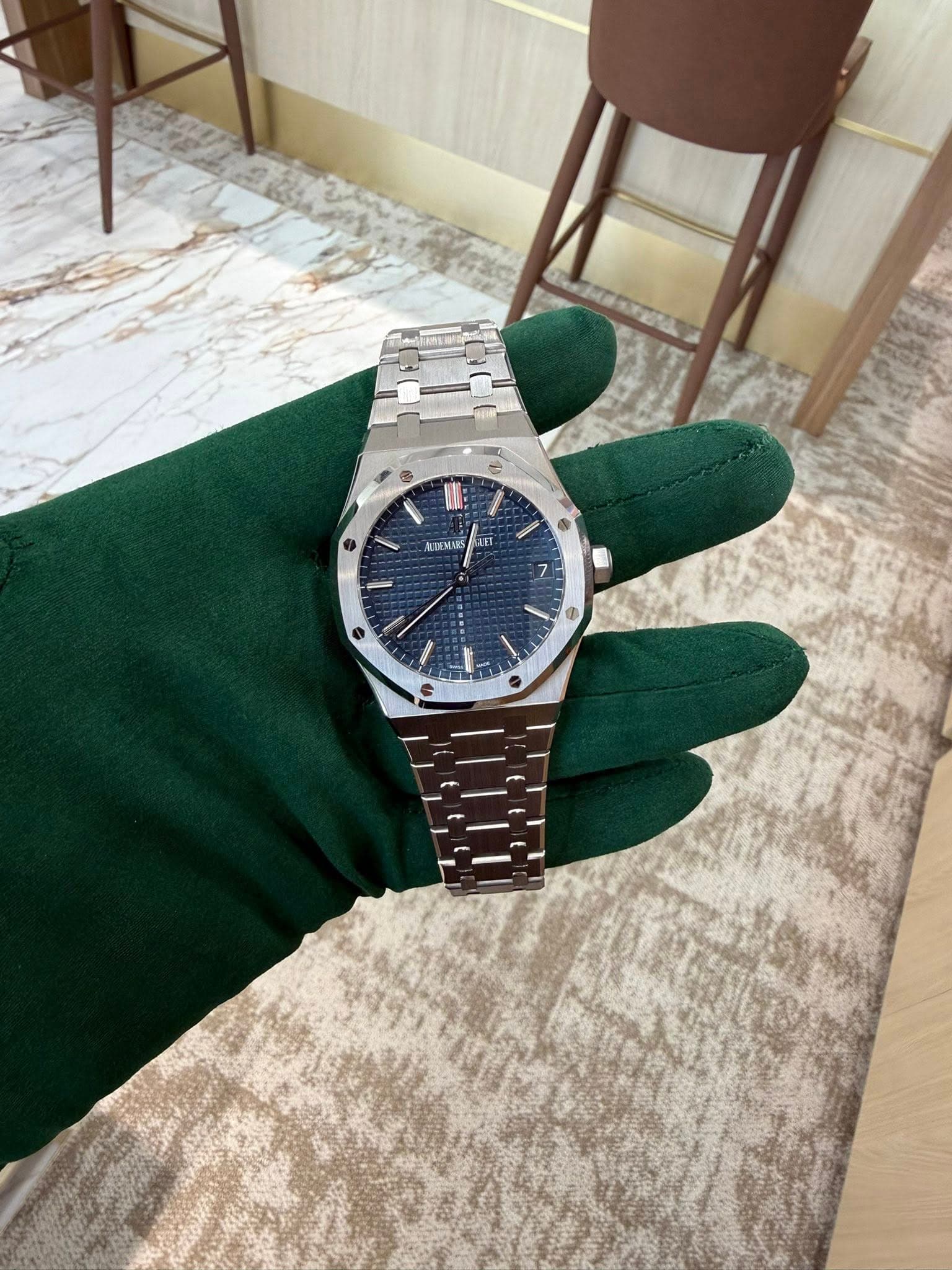 May be an image of wrist watch and text