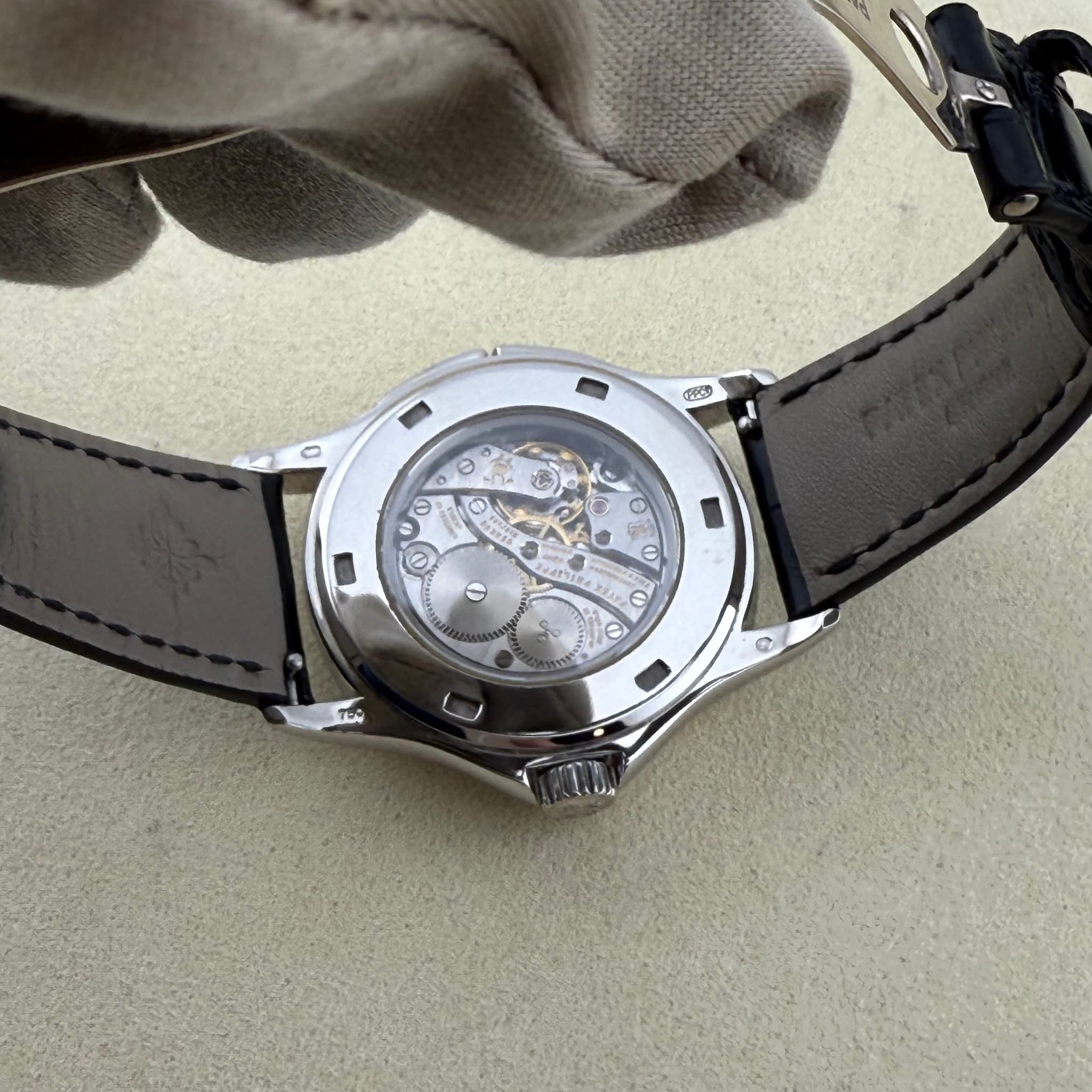 May be an image of wrist watch and text