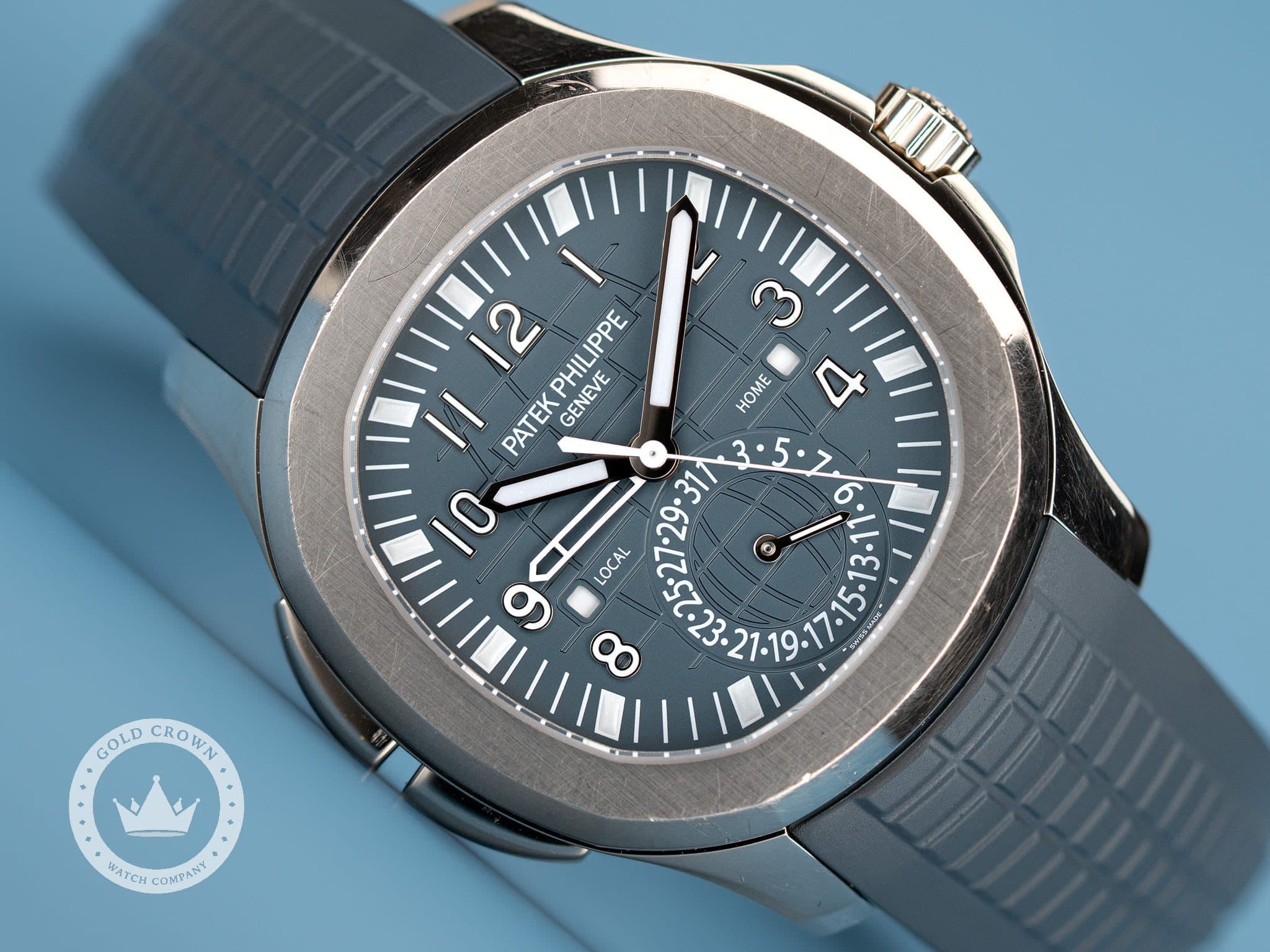 May be an image of wrist watch and text that says 'ب 12 PATEK PATEKPHILIPPE PHILIPPE GENEVE HOME 10 LOCAL 8 152527293T1 . GOLD GOLDCROWN CROWN - BATCH.COMBAST - WATCH OMPANY'
