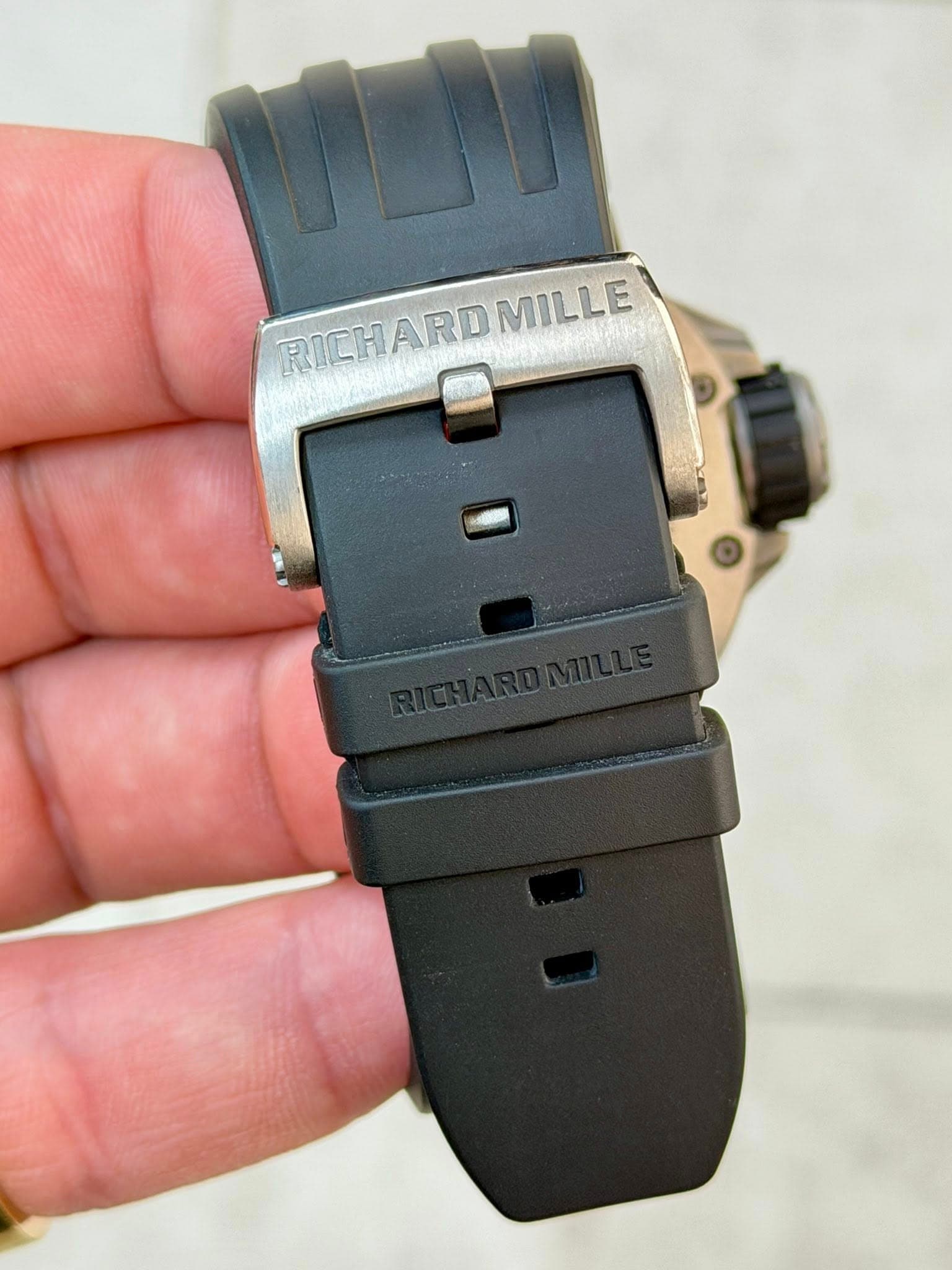 May be an image of digital watch and text that says 'RICHARD RICHARDMILLE RICH ICHARDMILLE MILLE'