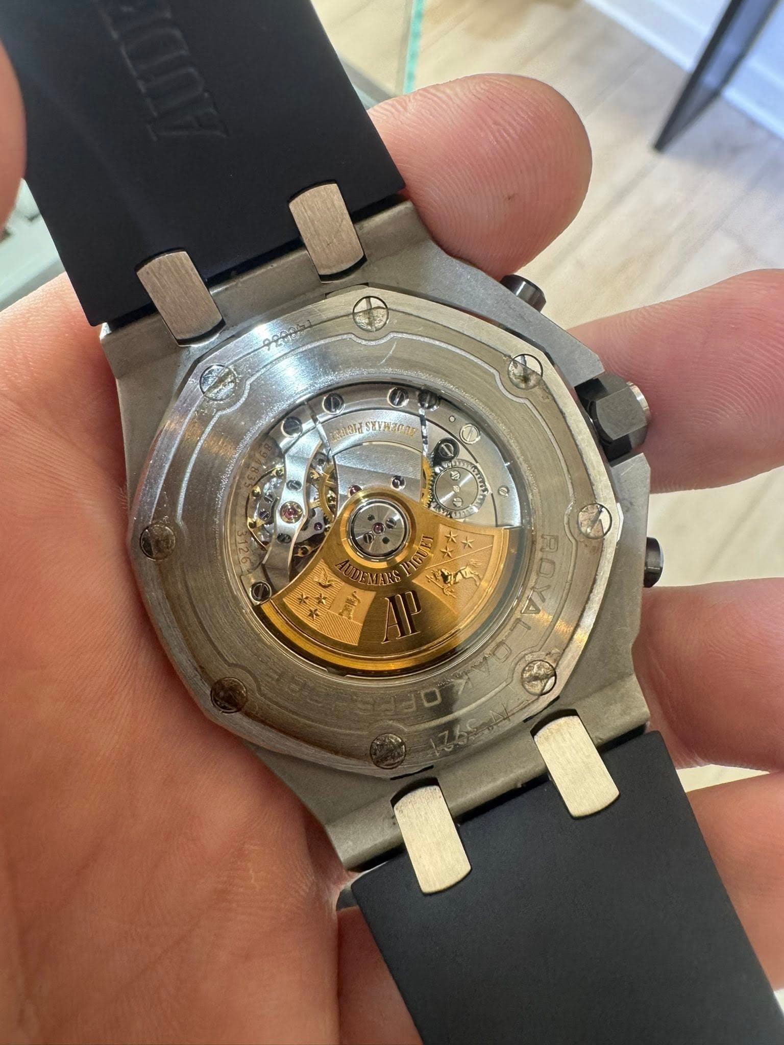 May be an image of wrist watch and text