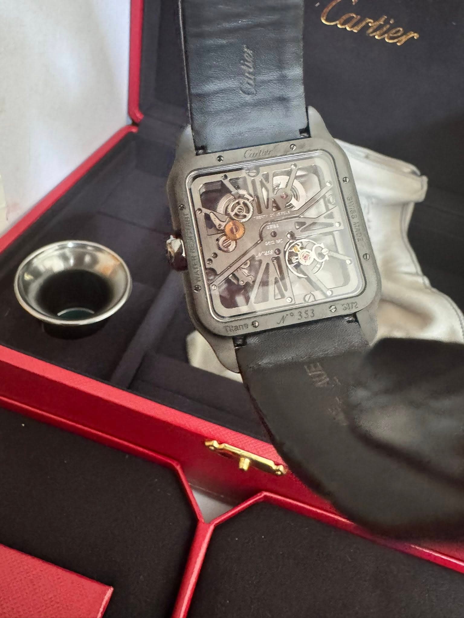 May be an image of wrist watch and text
