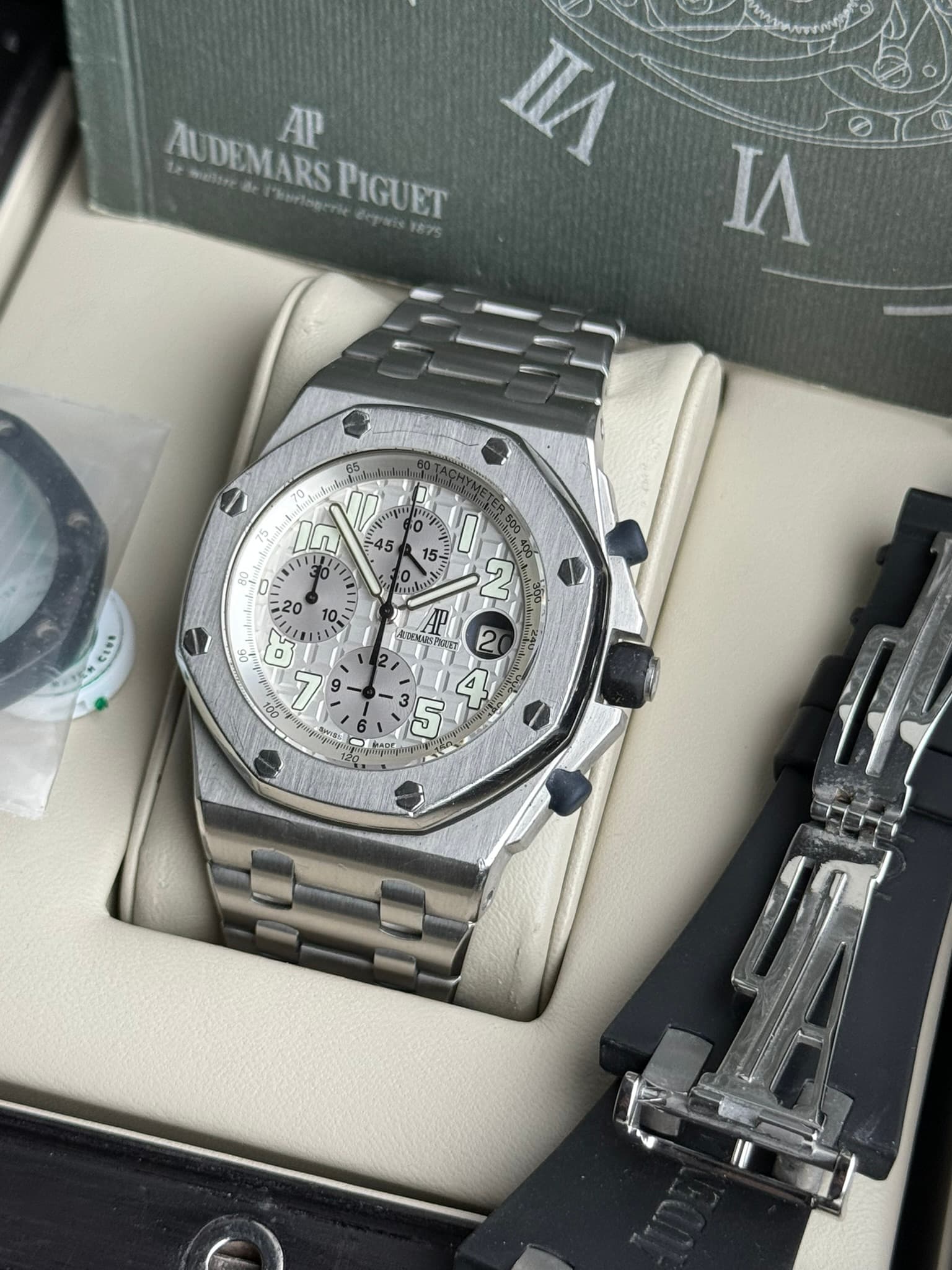 May be an image of wrist watch and text