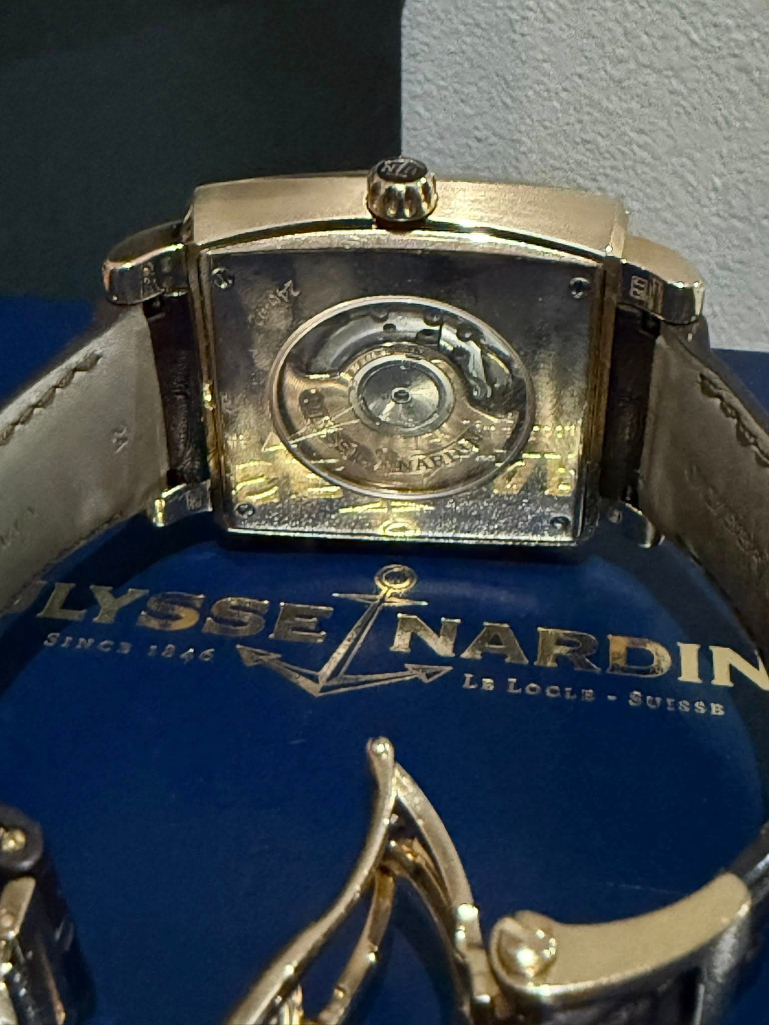 May be an image of wrist watch and text that says 'NERC ARES IN SUESSB'