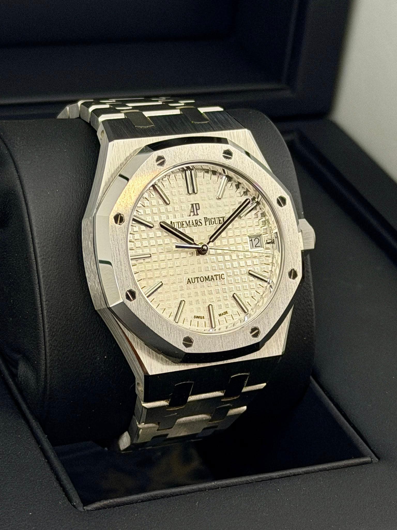 May be an image of wrist watch and text